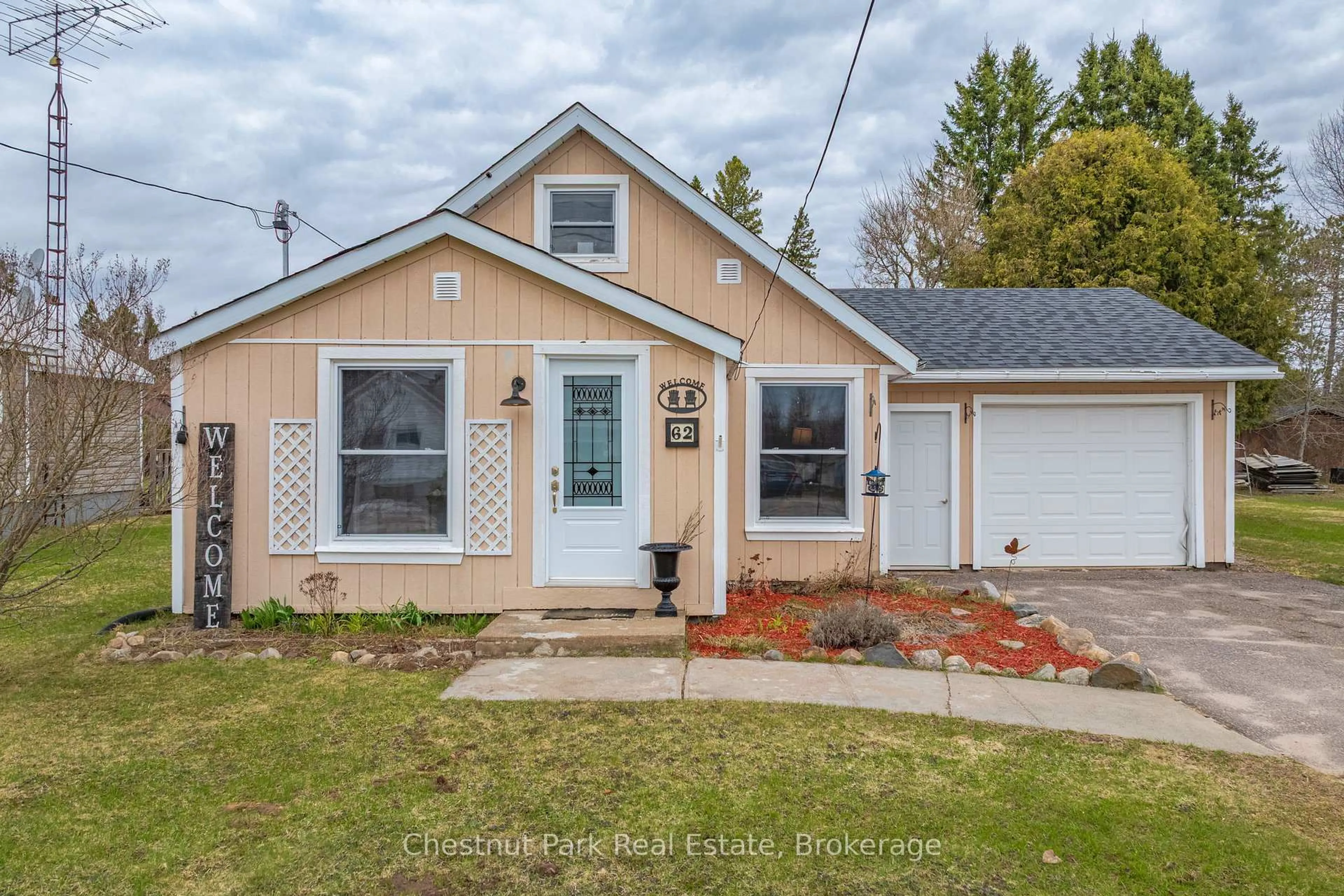 Home with vinyl exterior material, street for 62 Riverside Ave, South River Ontario P0A 1X0