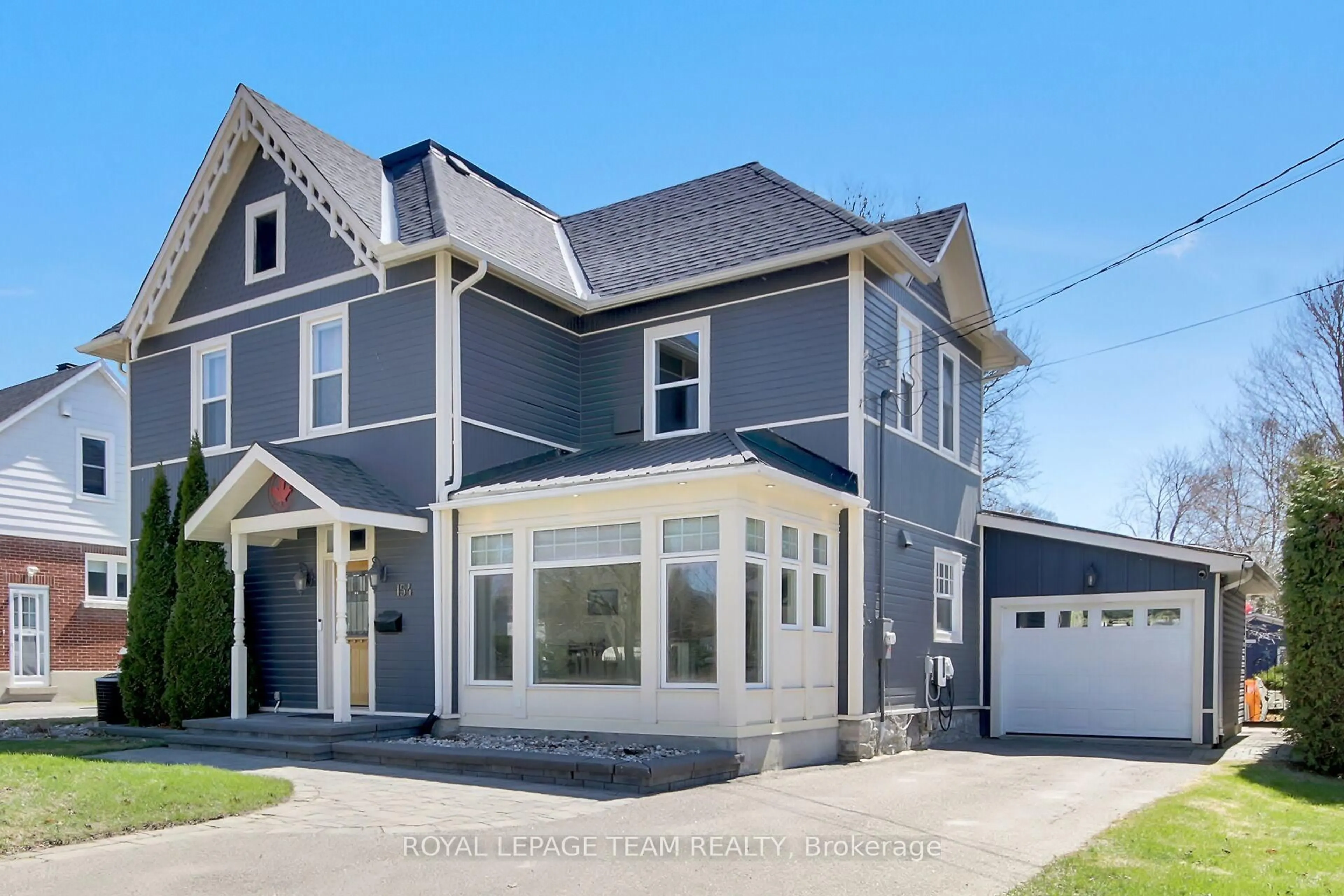 Home with vinyl exterior material, street for 154 Lake Ave, Carleton Place Ontario K7C 1J8