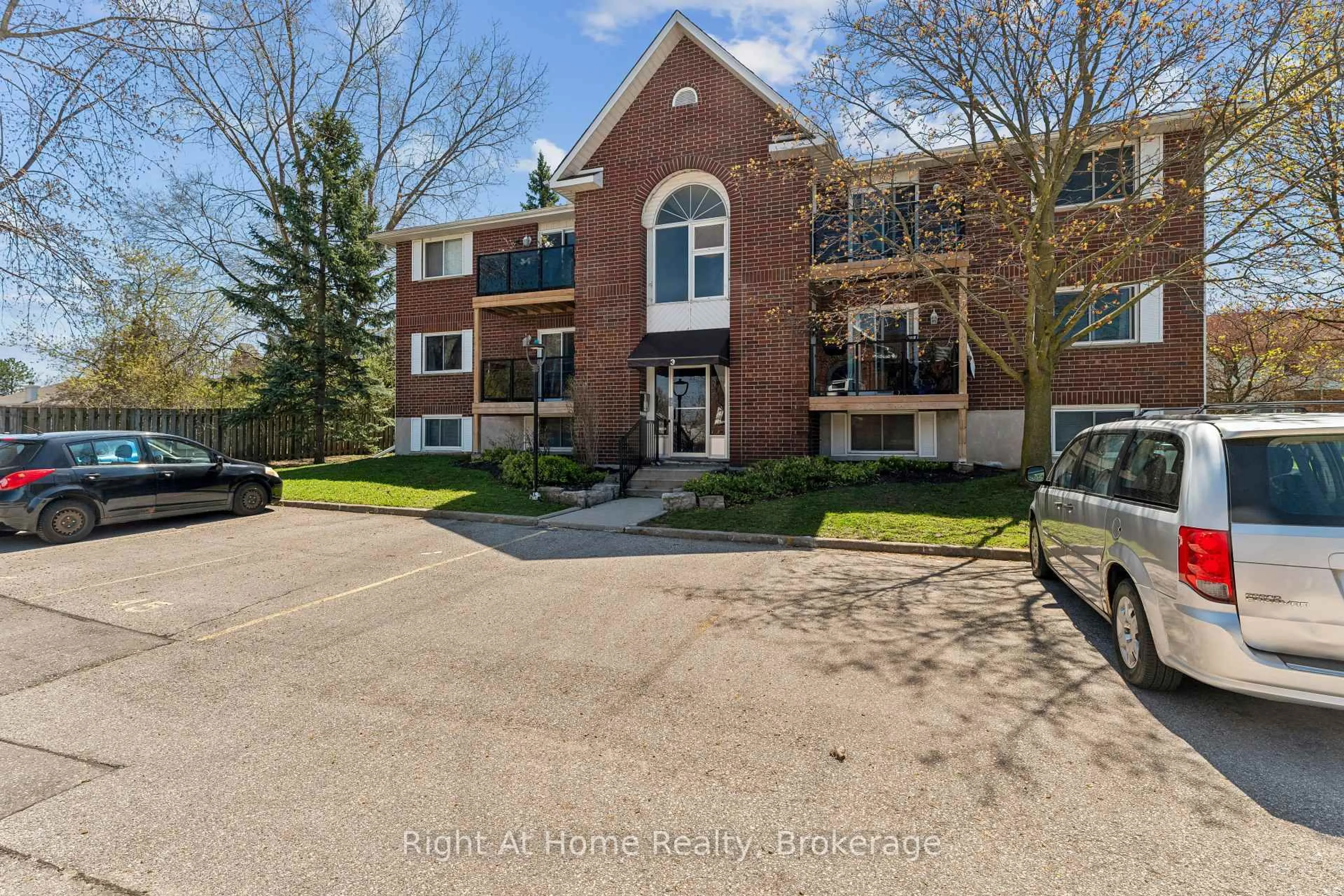 A pic from outside/outdoor area/front of a property/back of a property/a pic from drone, unknown for 565 GREENFIELD Ave #310, Kitchener Ontario N2C 2P3