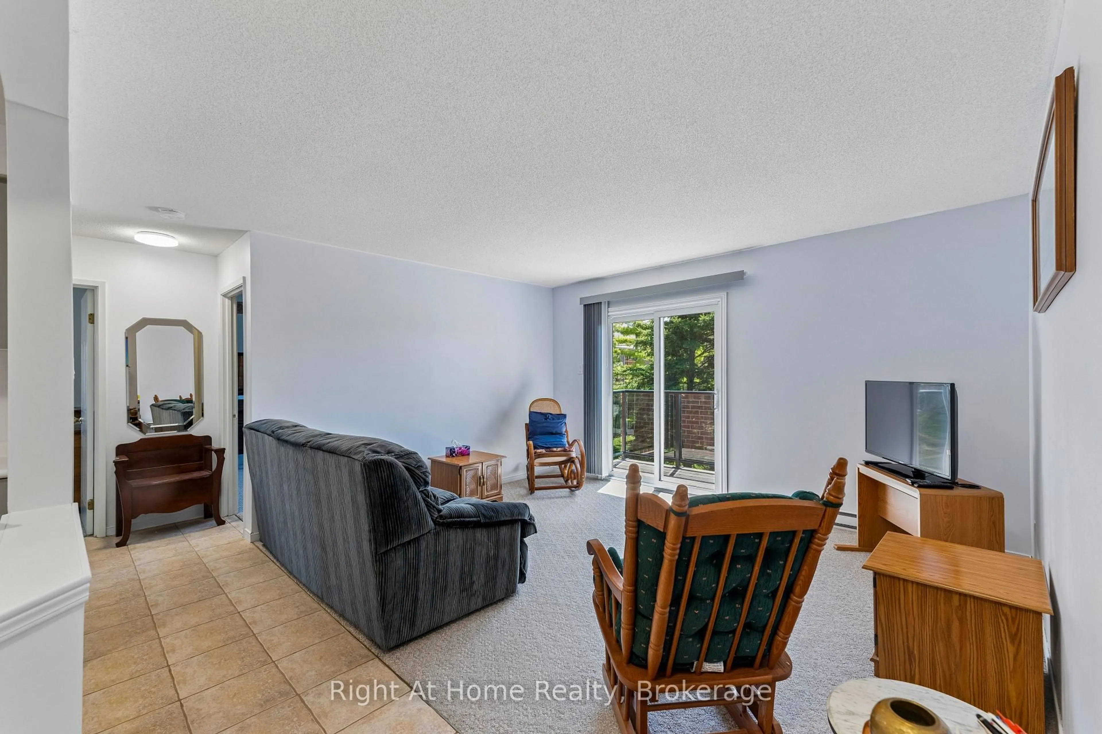Living room with furniture, unknown for 565 GREENFIELD Ave #310, Kitchener Ontario N2C 2P3