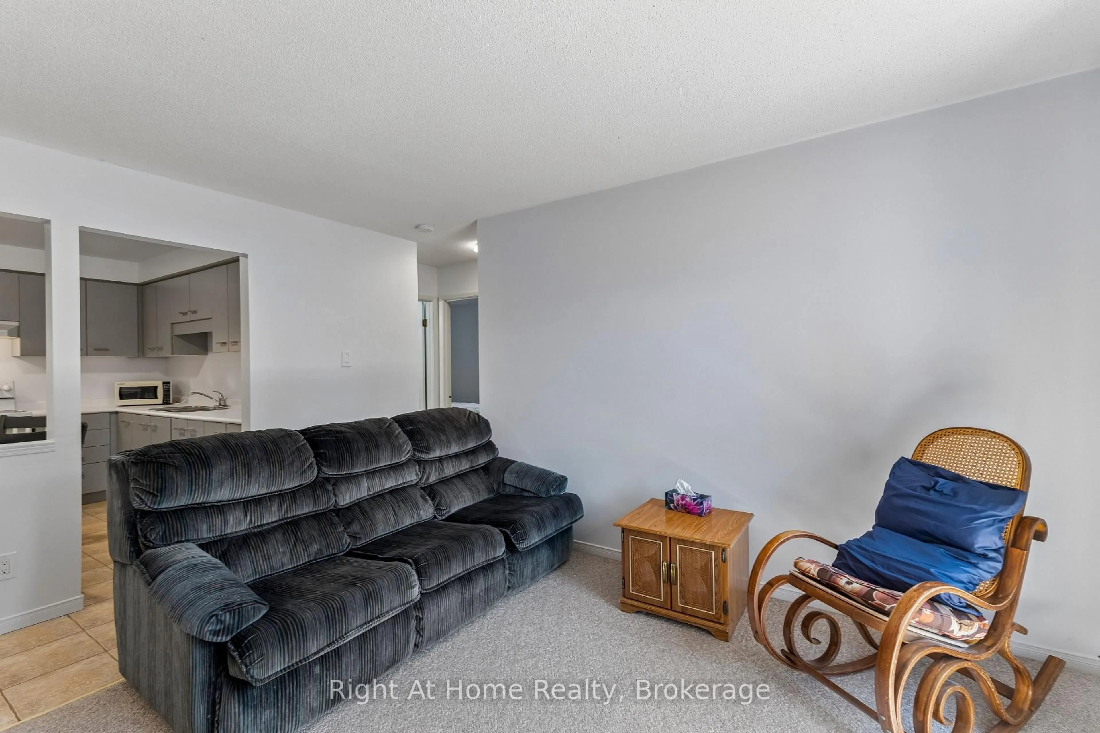 Living room with furniture, unknown for 565 GREENFIELD Ave #310, Kitchener Ontario N2C 2P3
