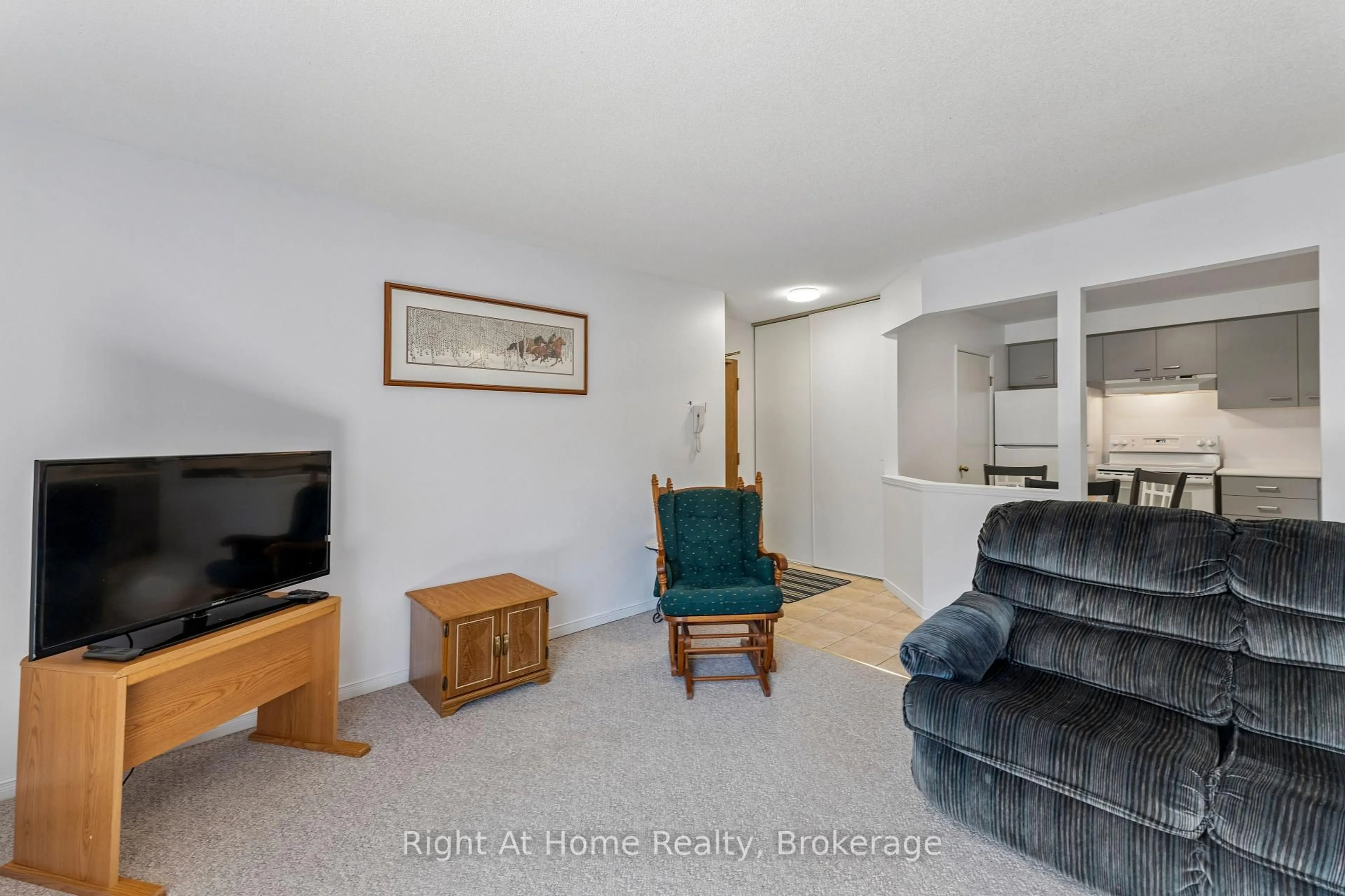 Living room with furniture, unknown for 565 GREENFIELD Ave #310, Kitchener Ontario N2C 2P3