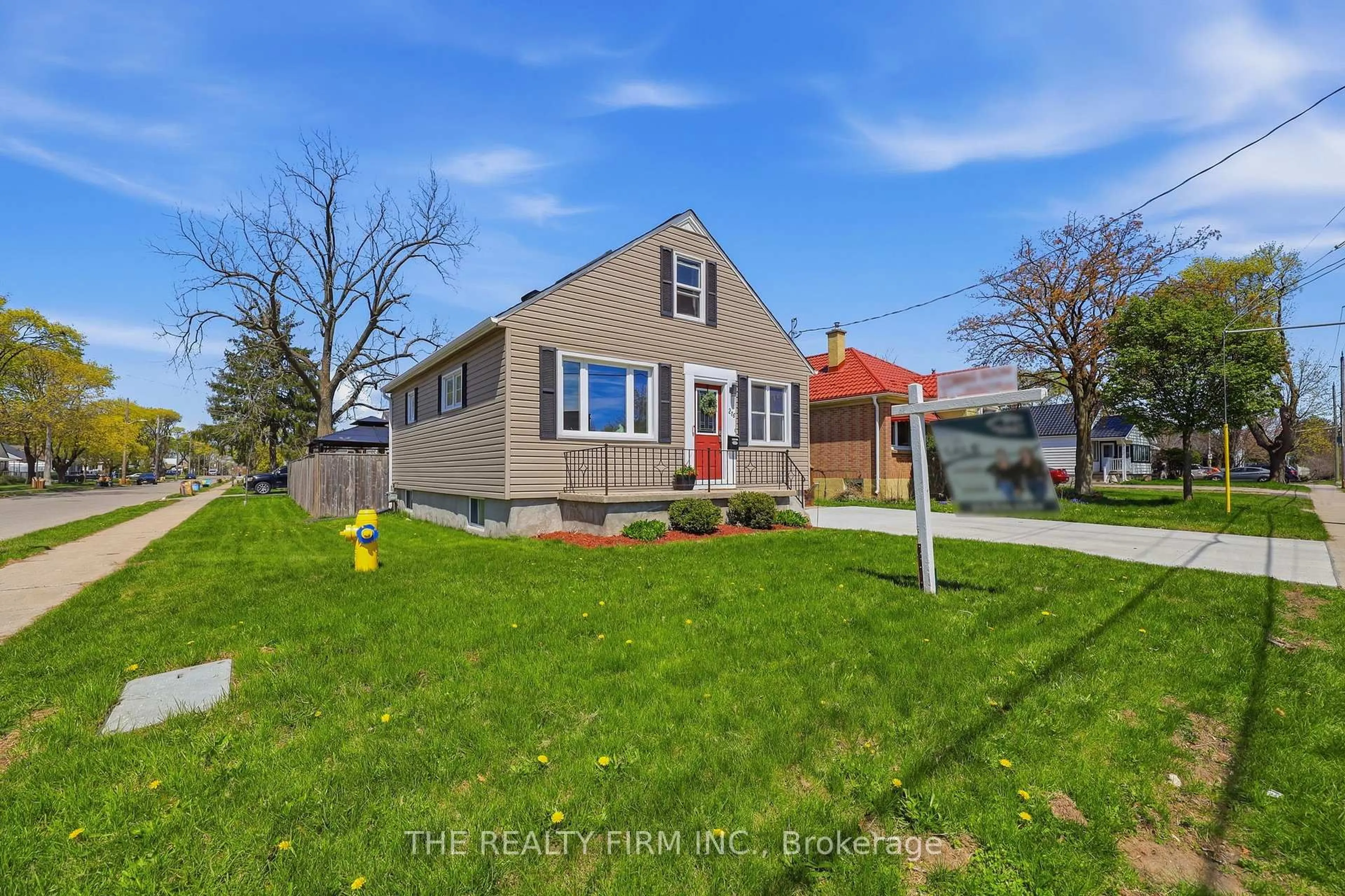 A pic from outside/outdoor area/front of a property/back of a property/a pic from drone, street for 216 Thompson Rd, London South Ontario N5Z 2Z1