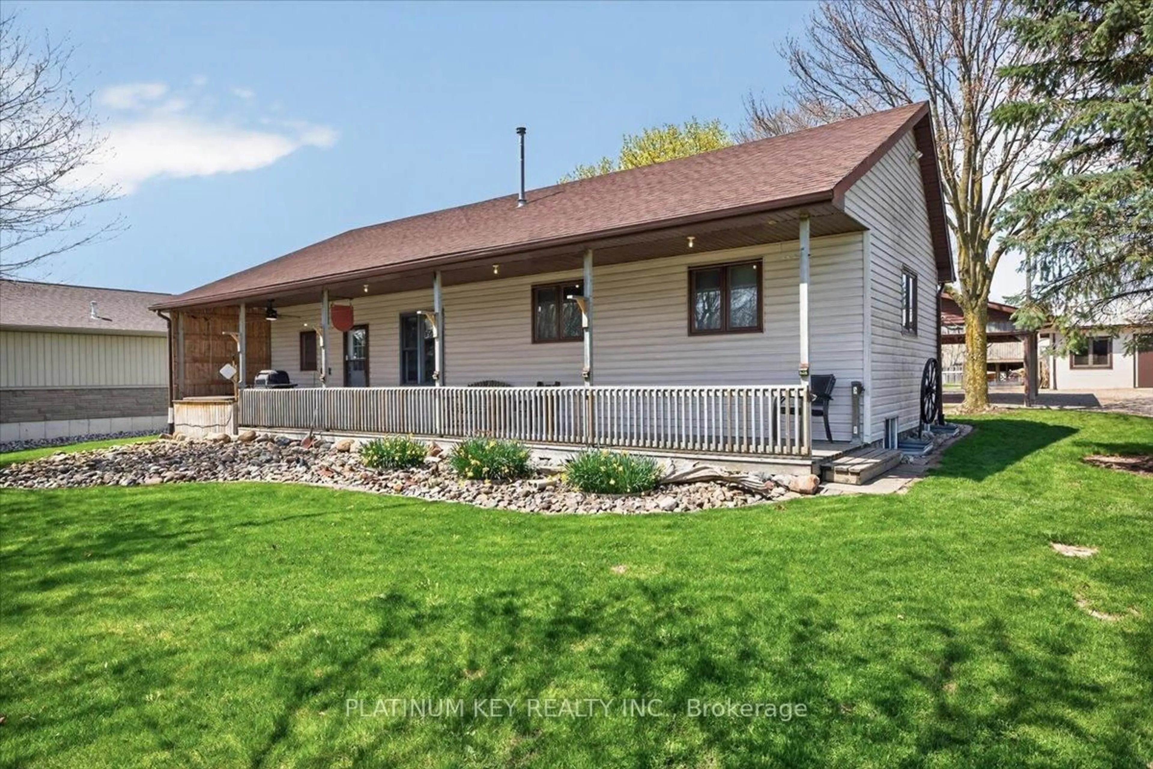 Home with vinyl exterior material, street for 2300 Egremont Dr, Adelaide Metcalfe Ontario N7G 3H6