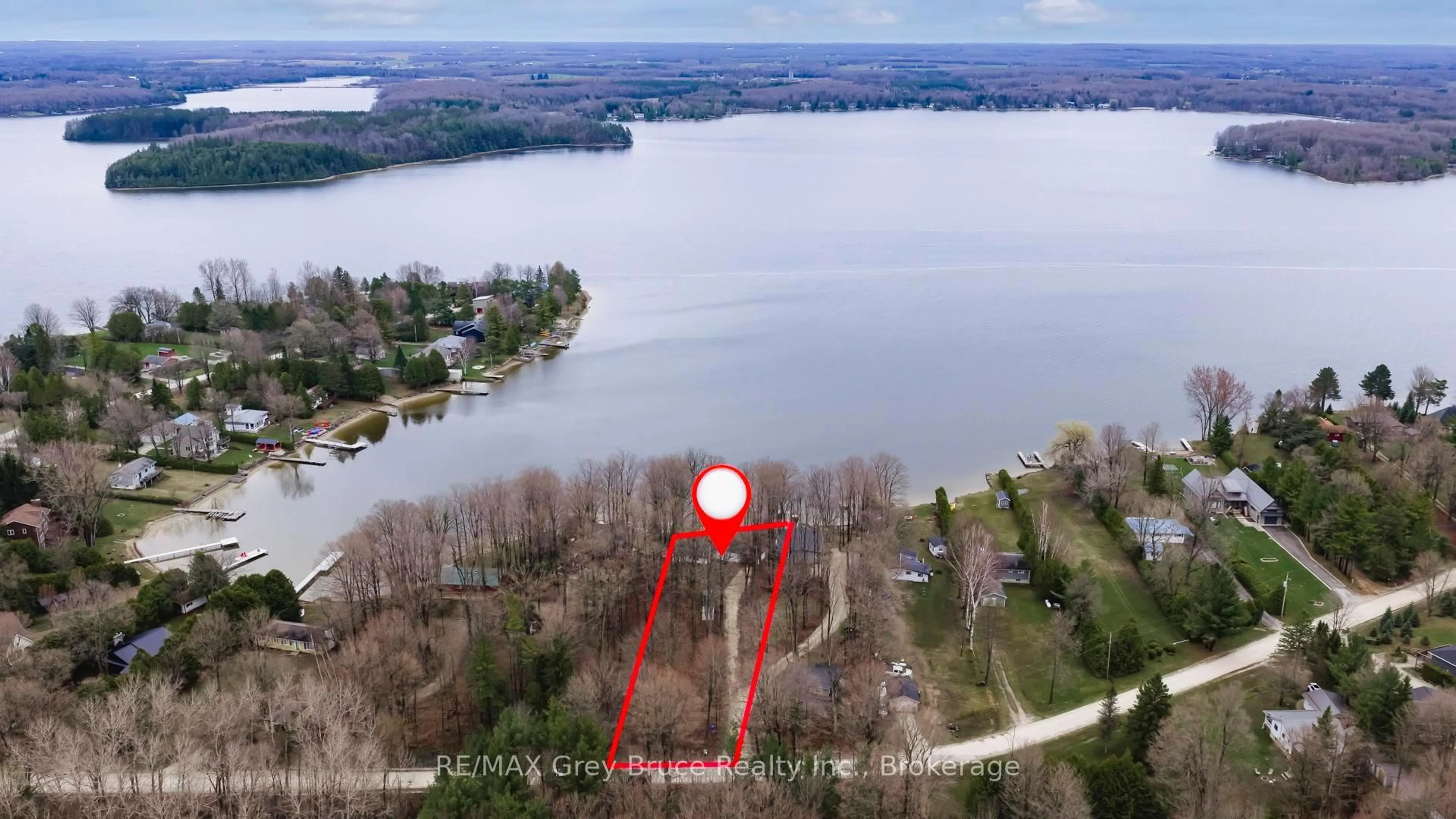 A pic from outside/outdoor area/front of a property/back of a property/a pic from drone, water/lake/river/ocean view for 124 Stanley Dr, Grey Highlands Ontario N0C 1E0