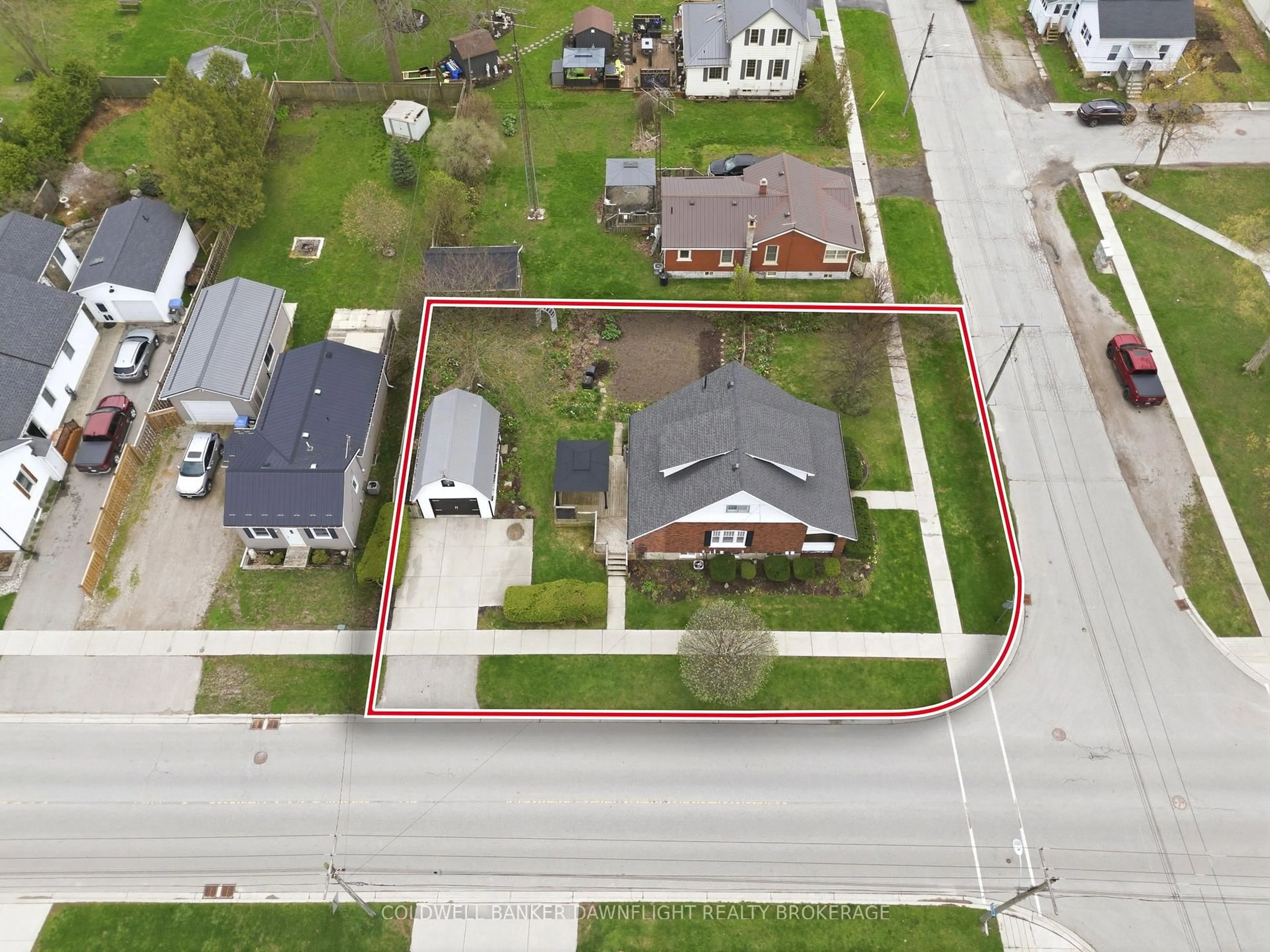 A pic from outside/outdoor area/front of a property/back of a property/a pic from drone, street for 484 Carling St, South Huron Ontario N0M 1S2