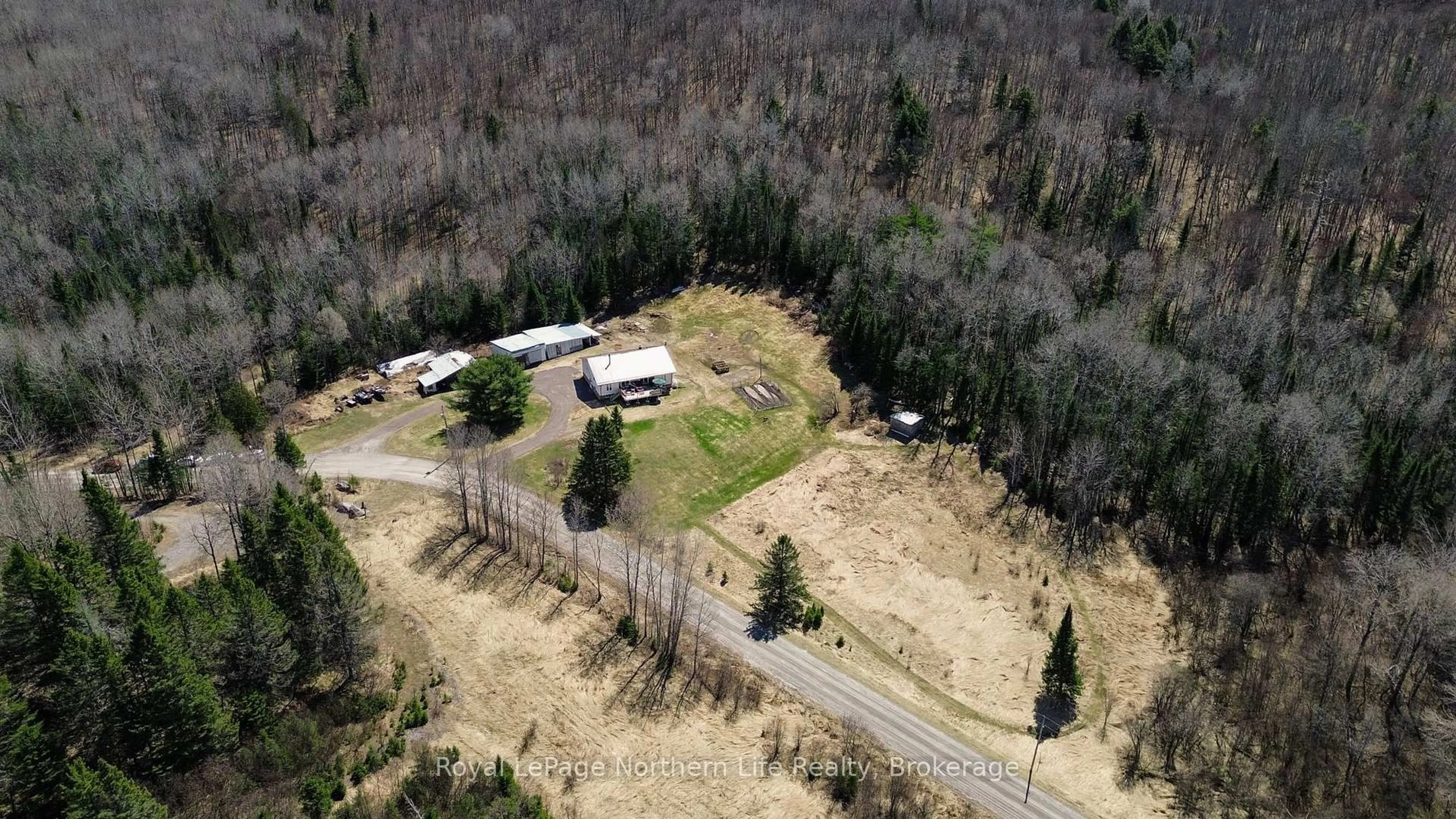 A pic from outside/outdoor area/front of a property/back of a property/a pic from drone, unknown for 121 Bennett Rd, Parry Sound Remote Area Ontario P0H 1J0