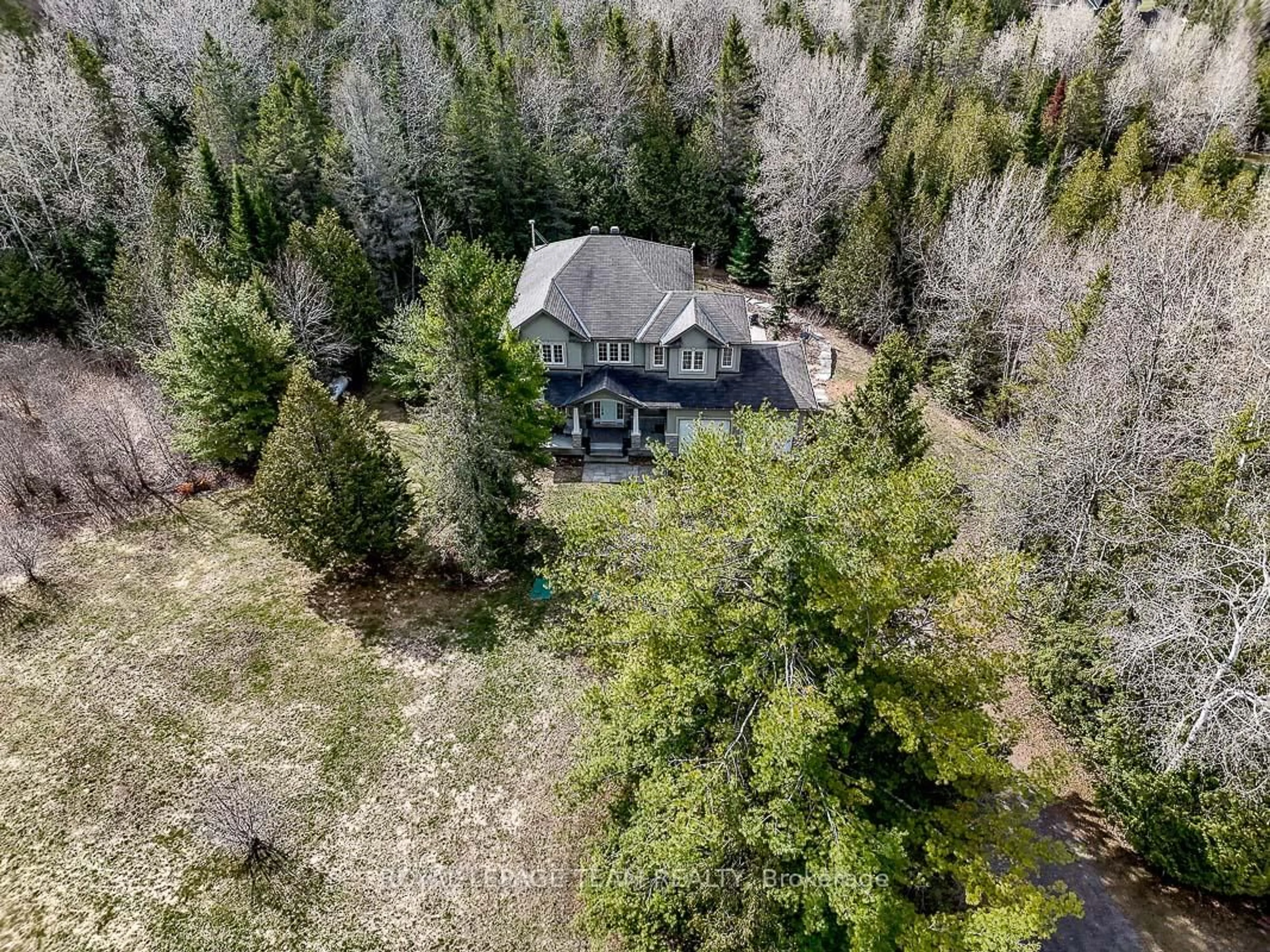 A pic from outside/outdoor area/front of a property/back of a property/a pic from drone, forest/trees view for 1840 Corkery Rd, Carp Ontario K0A 1L0