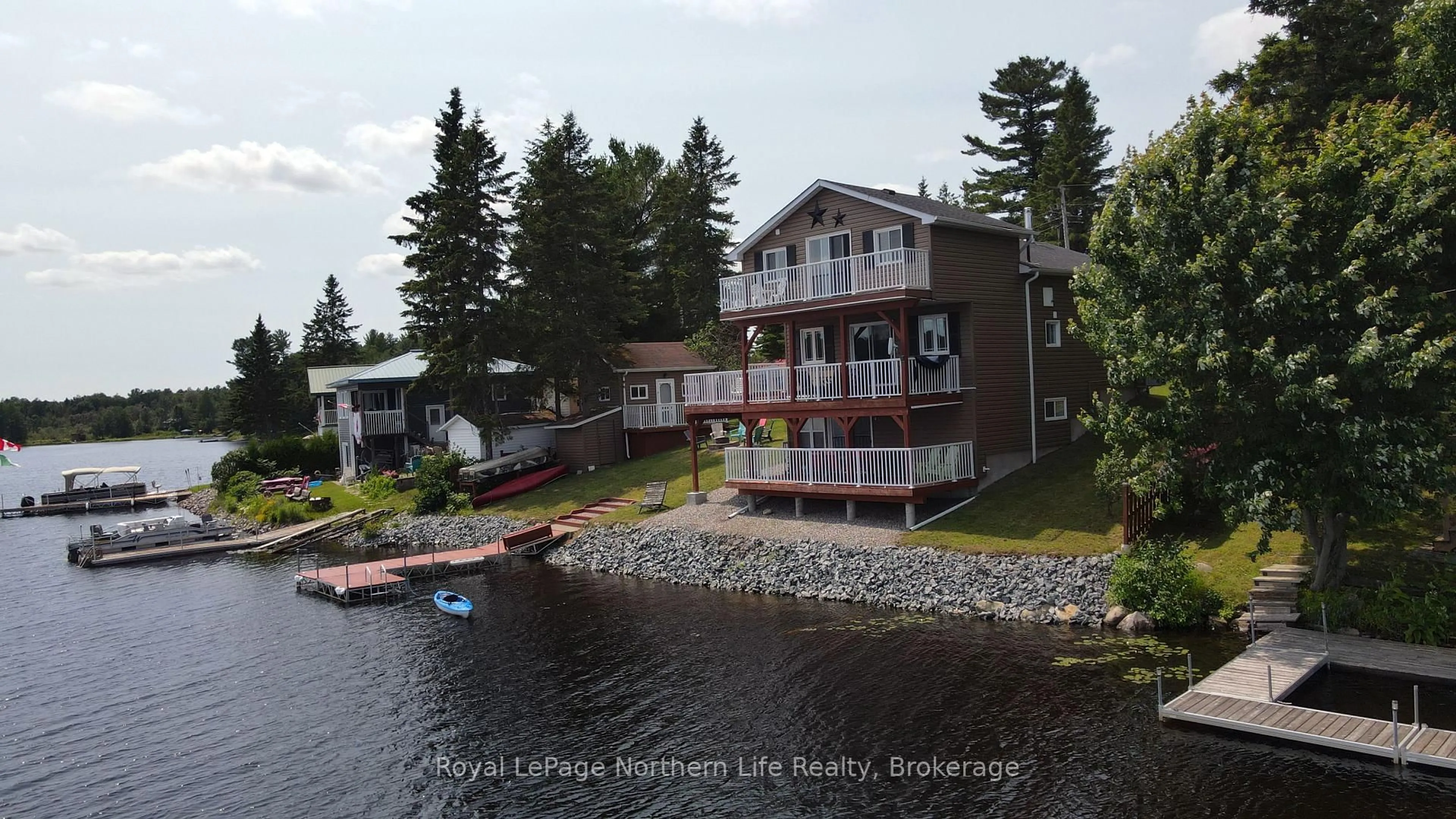 A pic from outside/outdoor area/front of a property/back of a property/a pic from drone, water/lake/river/ocean view for 30 Presqu'ile Rd, West Nipissing Ontario P0H 2M0