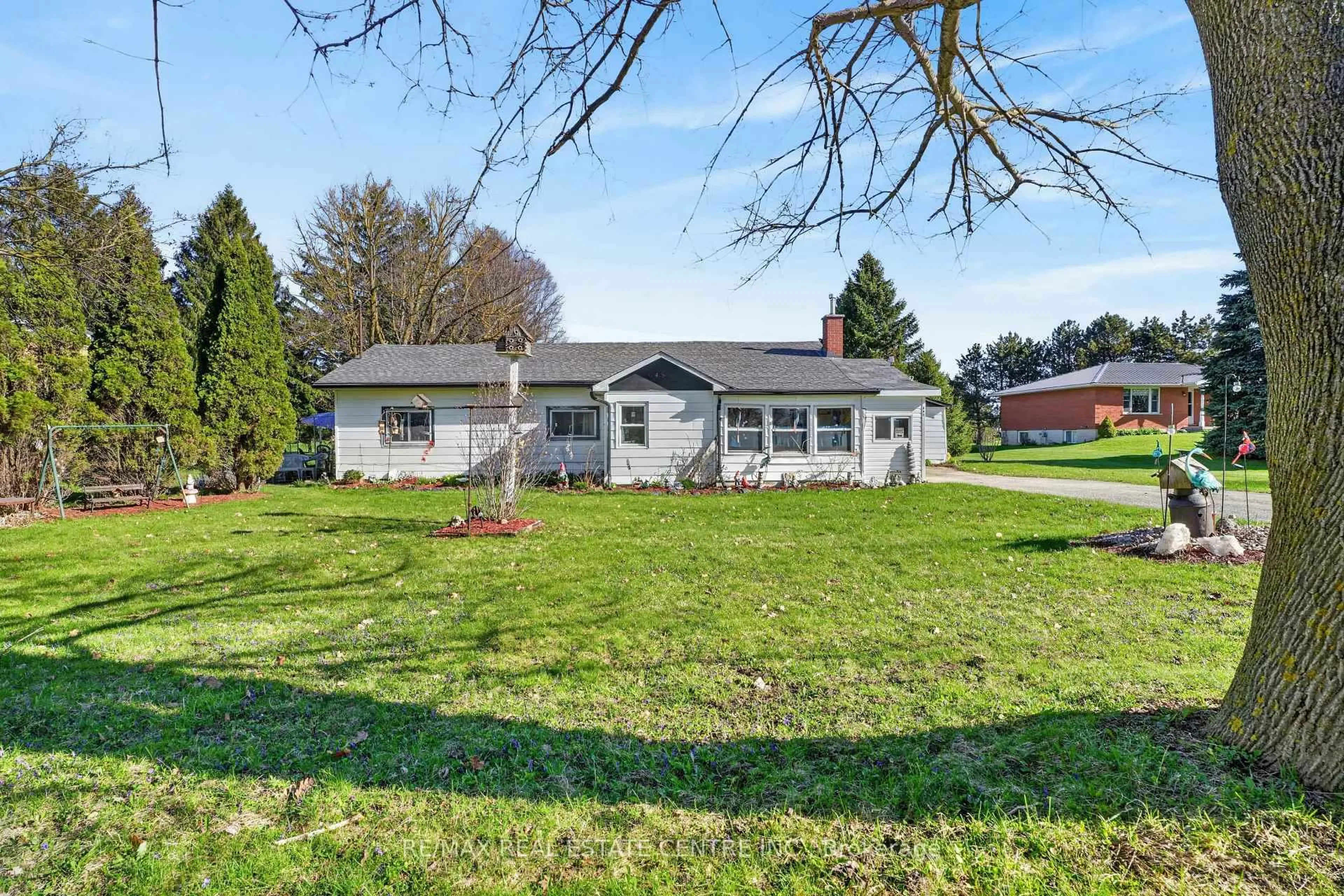 A pic from outside/outdoor area/front of a property/back of a property/a pic from drone, unknown for 645 Queen St, Wellington North Ontario N0G 2L1