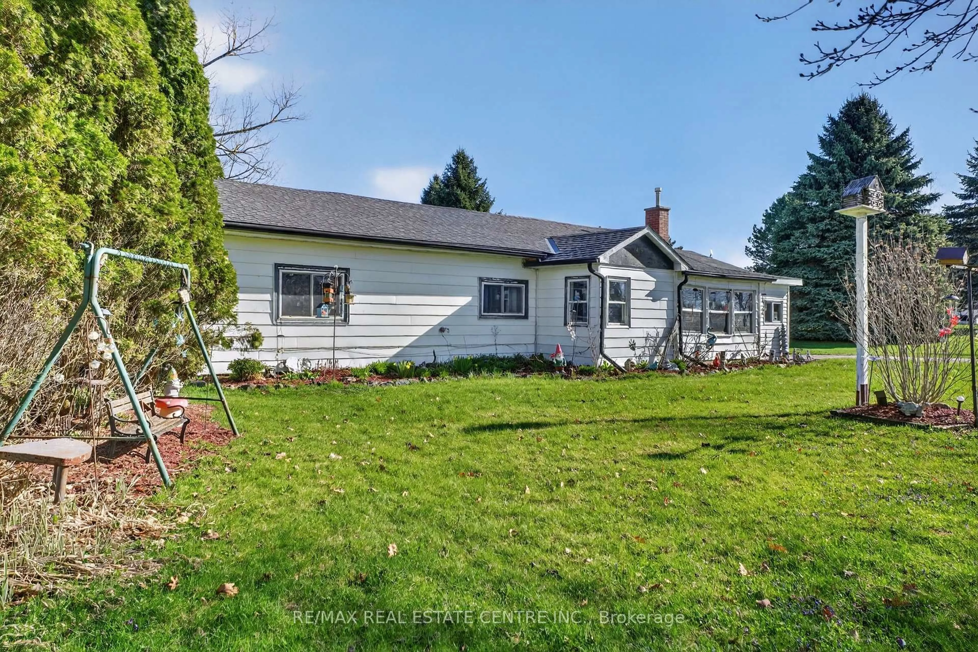 A pic from outside/outdoor area/front of a property/back of a property/a pic from drone, unknown for 645 Queen St, Wellington North Ontario N0G 2L1
