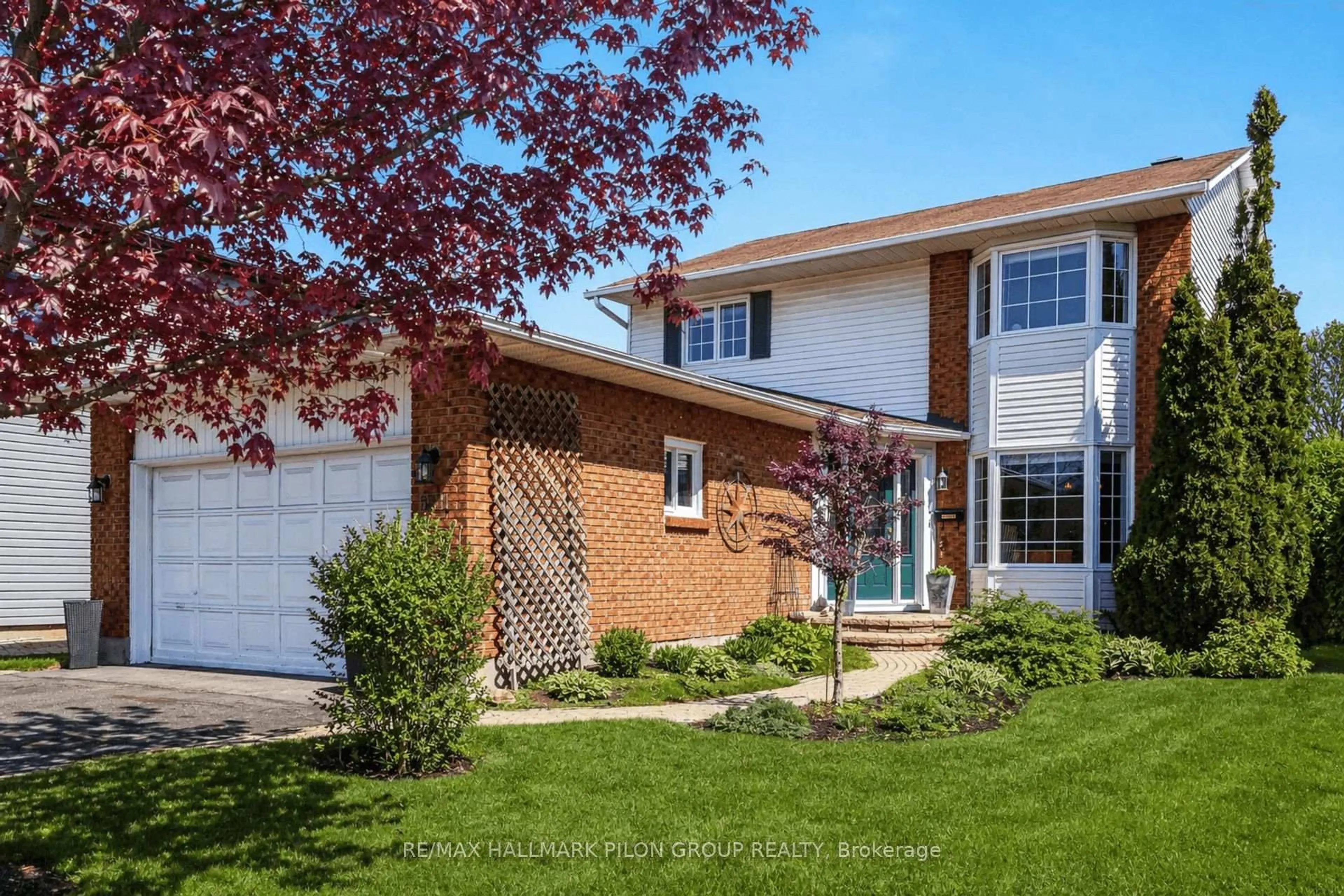 Home with brick exterior material, street for 6321 Beausejour Dr, Orleans Ontario K1C 3J6