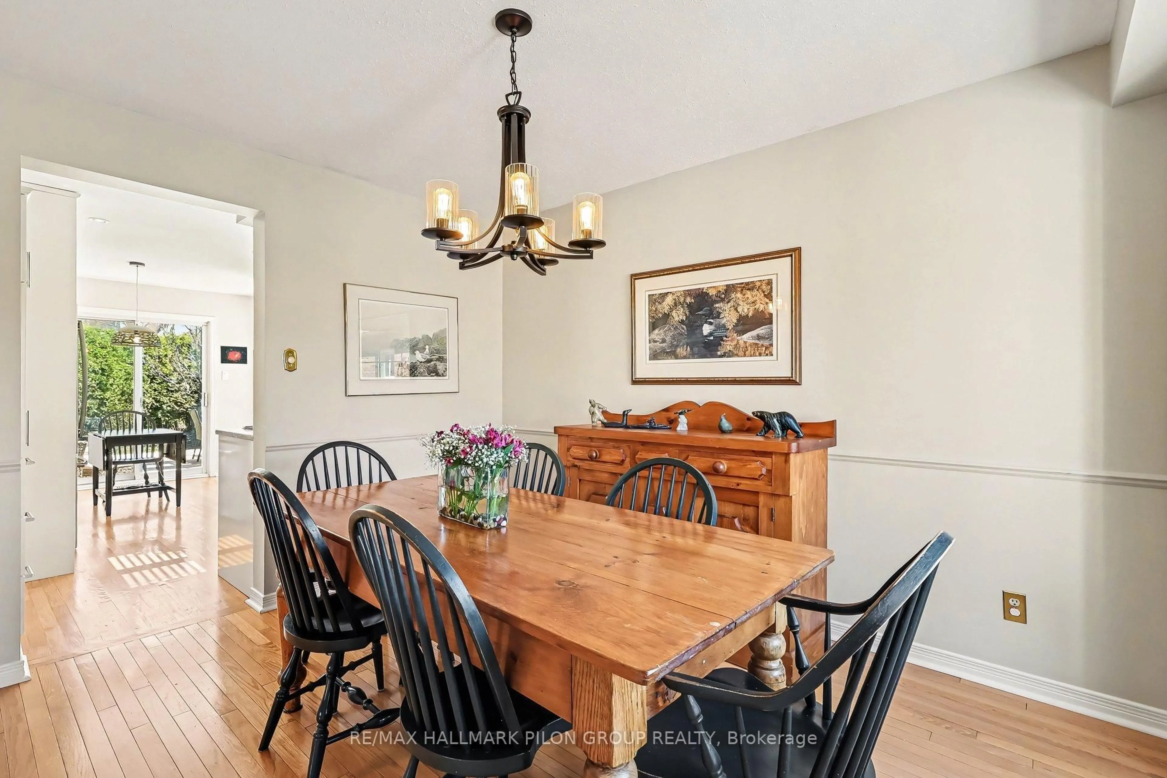 Dining room, wood/laminate floor for 6321 Beausejour Dr, Orleans Ontario K1C 3J6