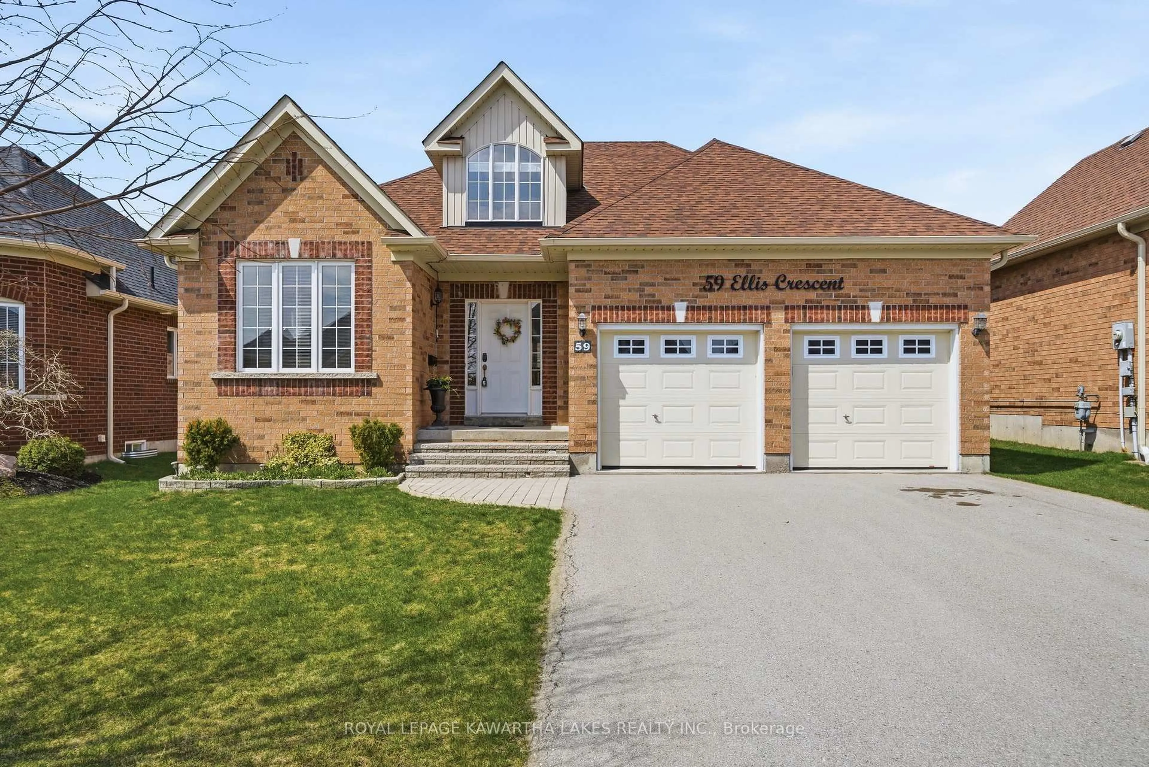 Home with brick exterior material, street for 59 Ellis Cres, Kawartha Lakes Ontario K9V 0A5