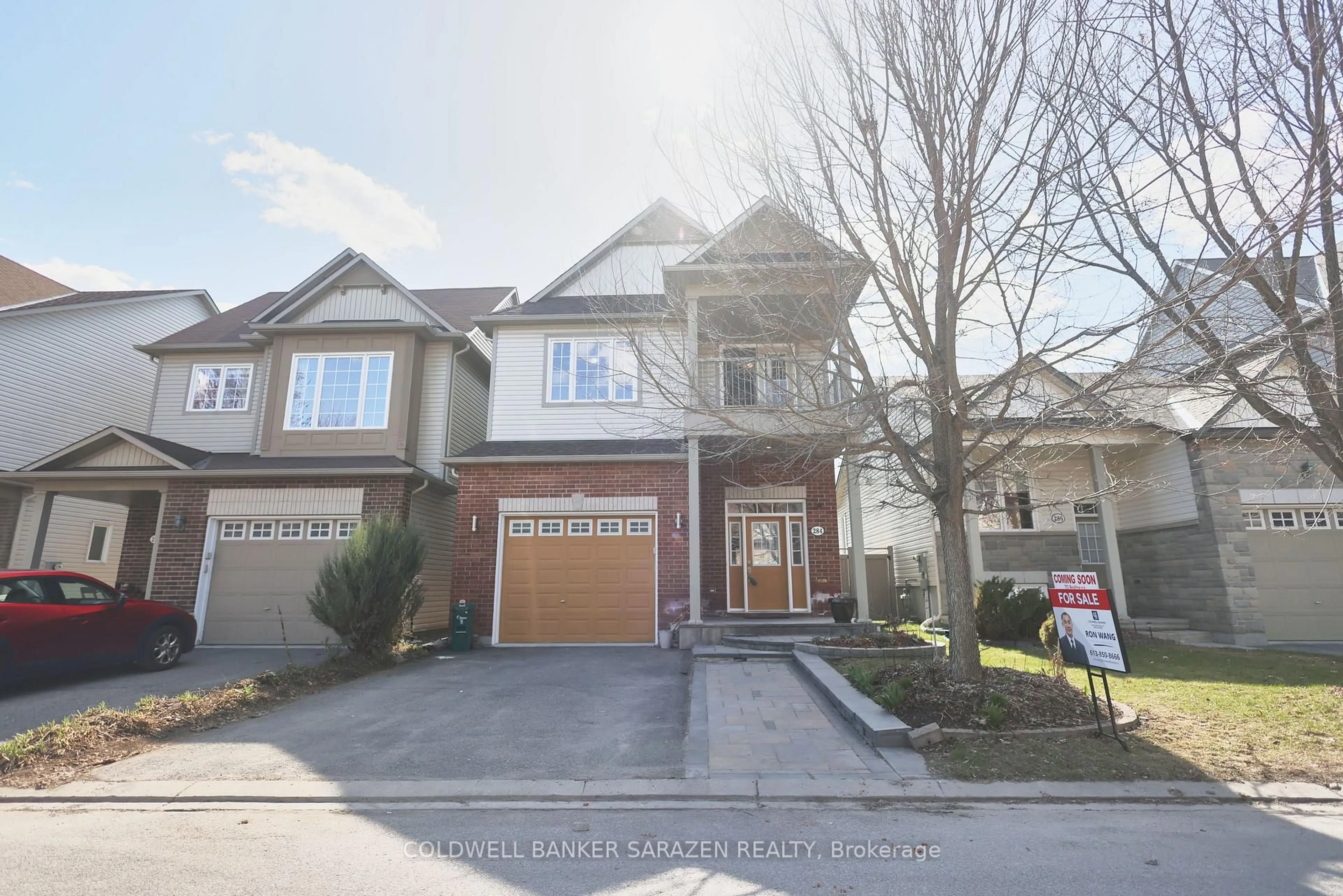 Home with brick exterior material, street for 284 Harthill Way, Ottawa Ontario K2J 0P3