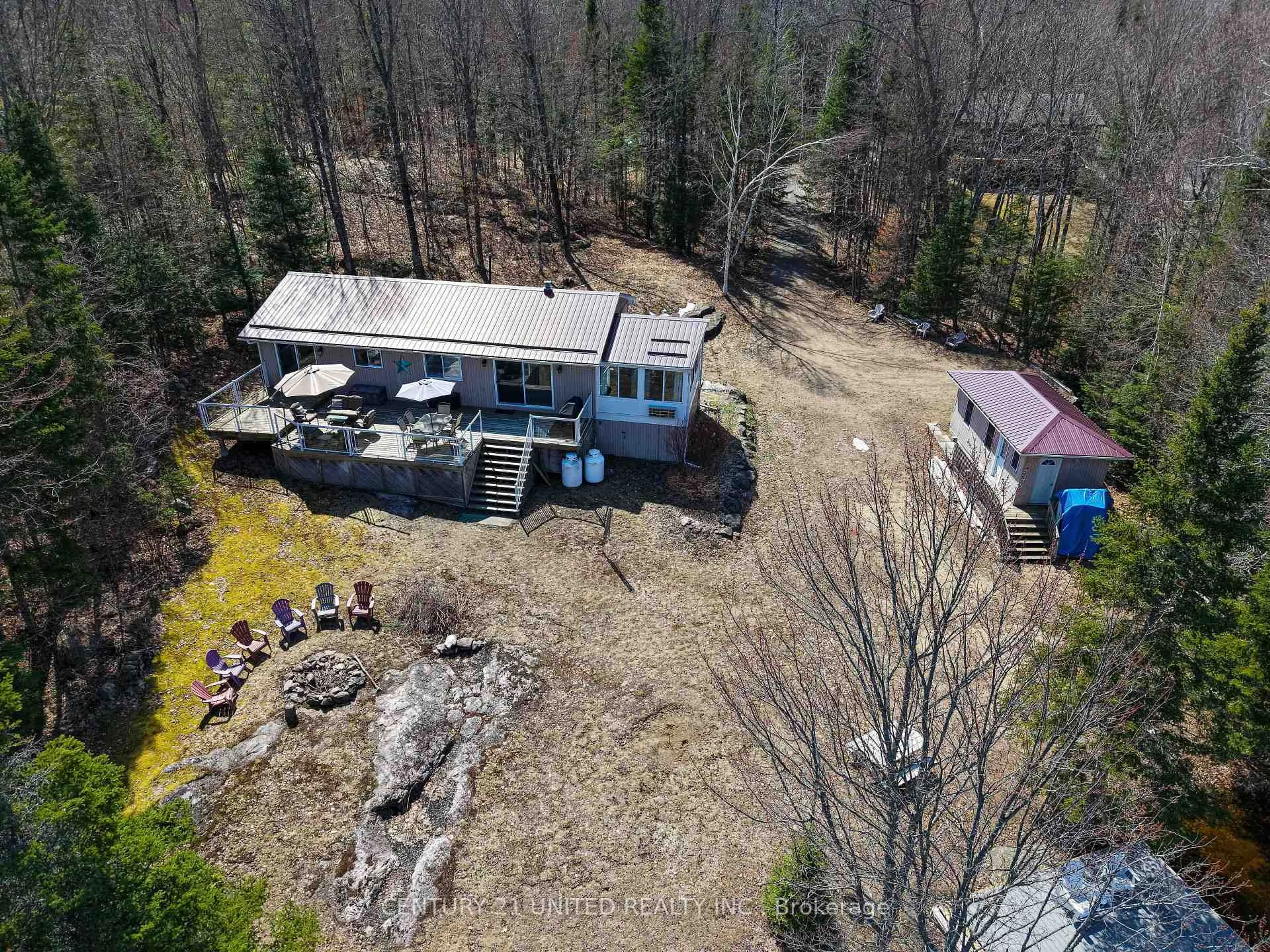 A pic from outside/outdoor area/front of a property/back of a property/a pic from drone, unknown for 1047 Redwood Lane, Highlands East Ontario K0L 1C0