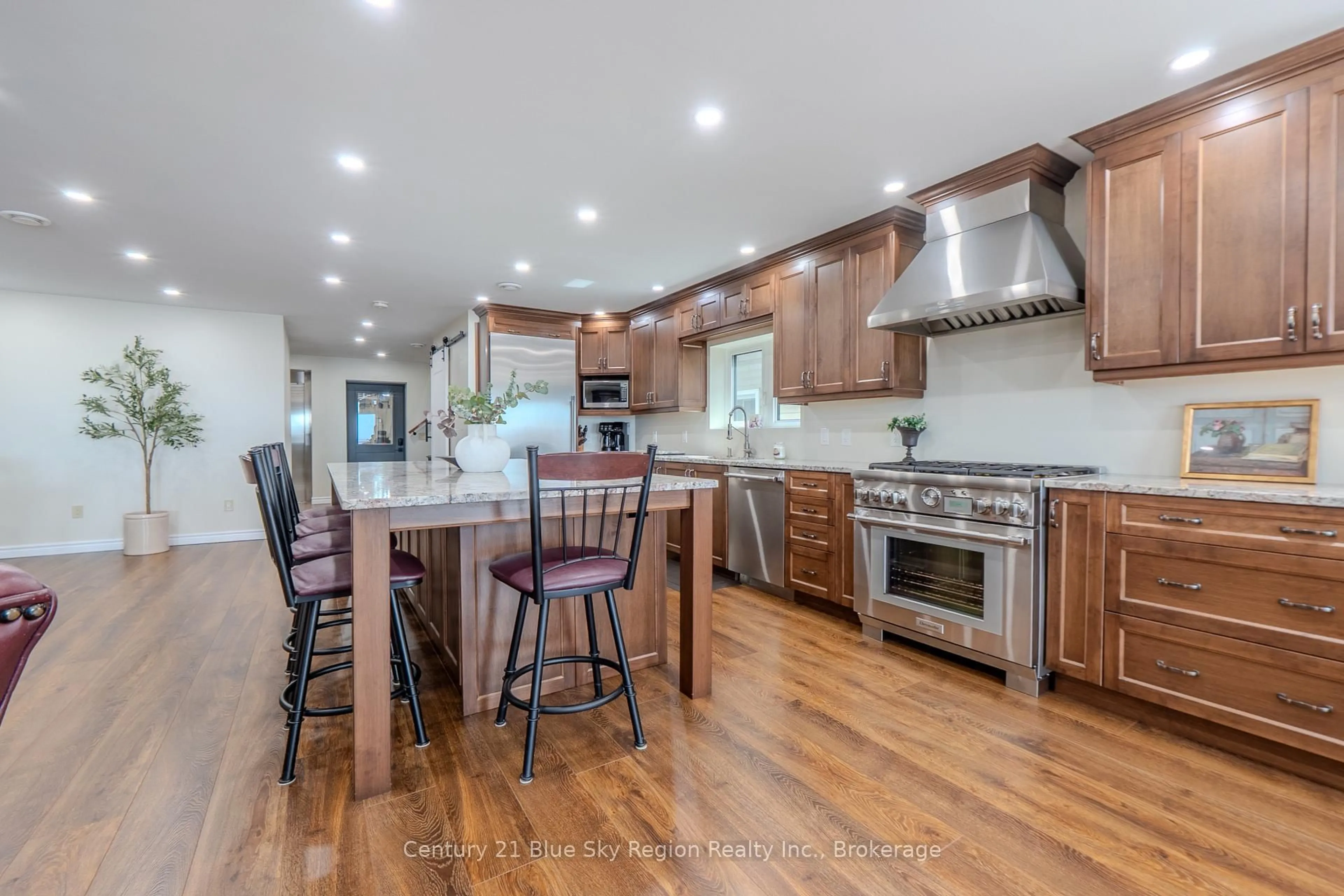 Open concept kitchen, wood/laminate floor for 715 Lakeshore Dr, North Bay Ontario P1A 2G3