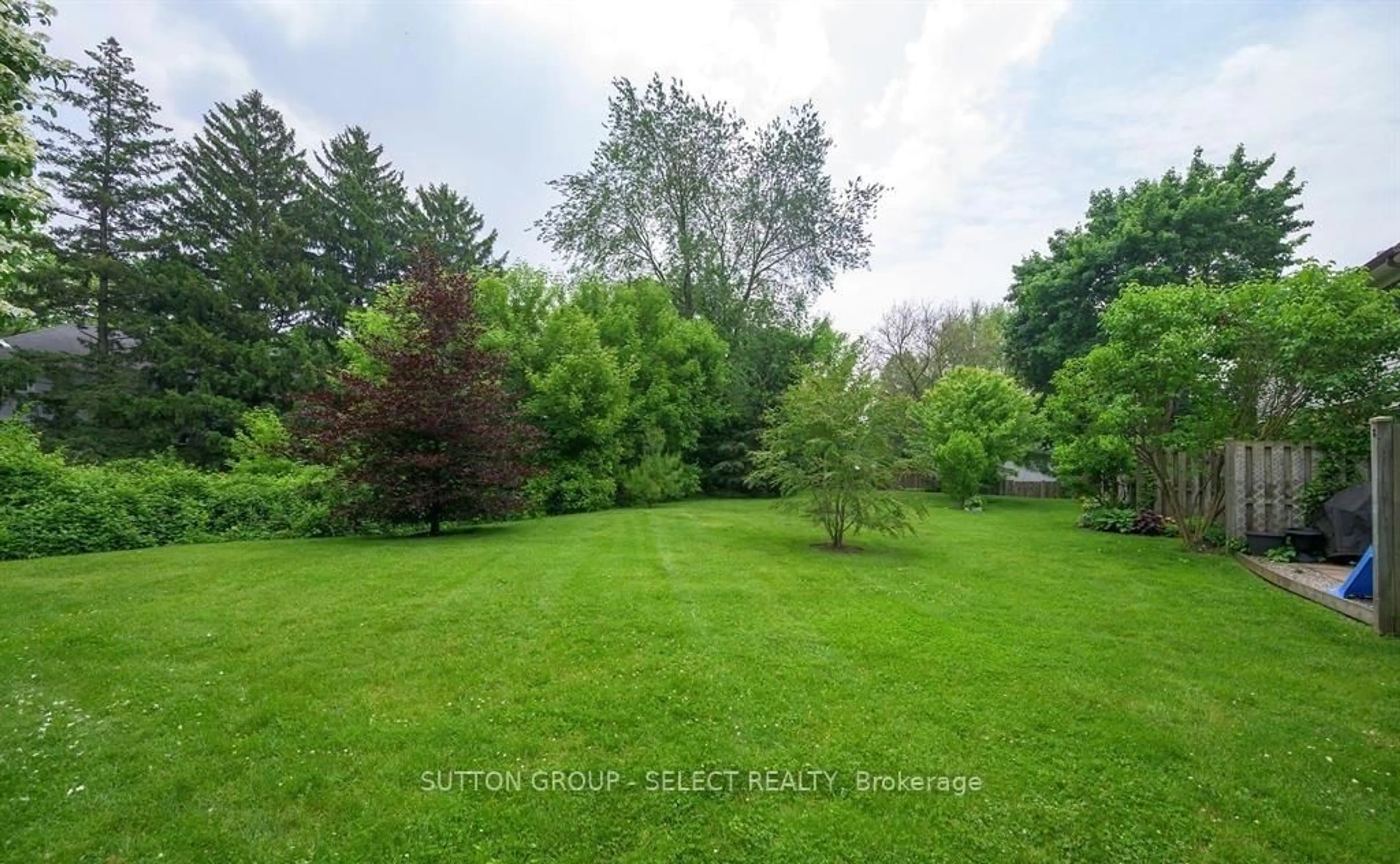 A pic from outside/outdoor area/front of a property/back of a property/a pic from drone, forest/trees view for 1328 Commissioners Rd #88, London South Ontario N6K 2Y6