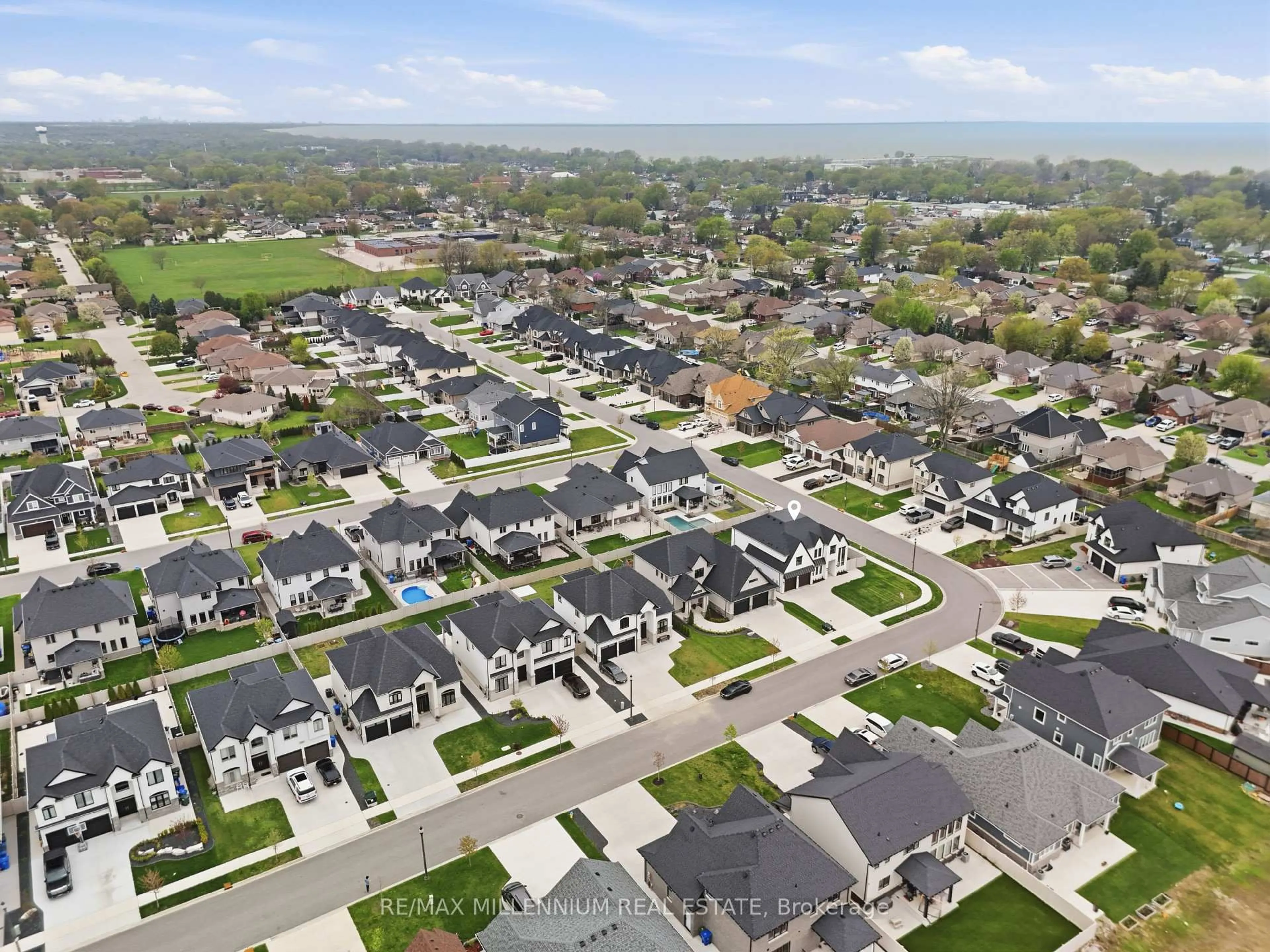 A pic from outside/outdoor area/front of a property/back of a property/a pic from drone, street for 332 Christine Ave, Lakeshore Ontario N0R 1A0