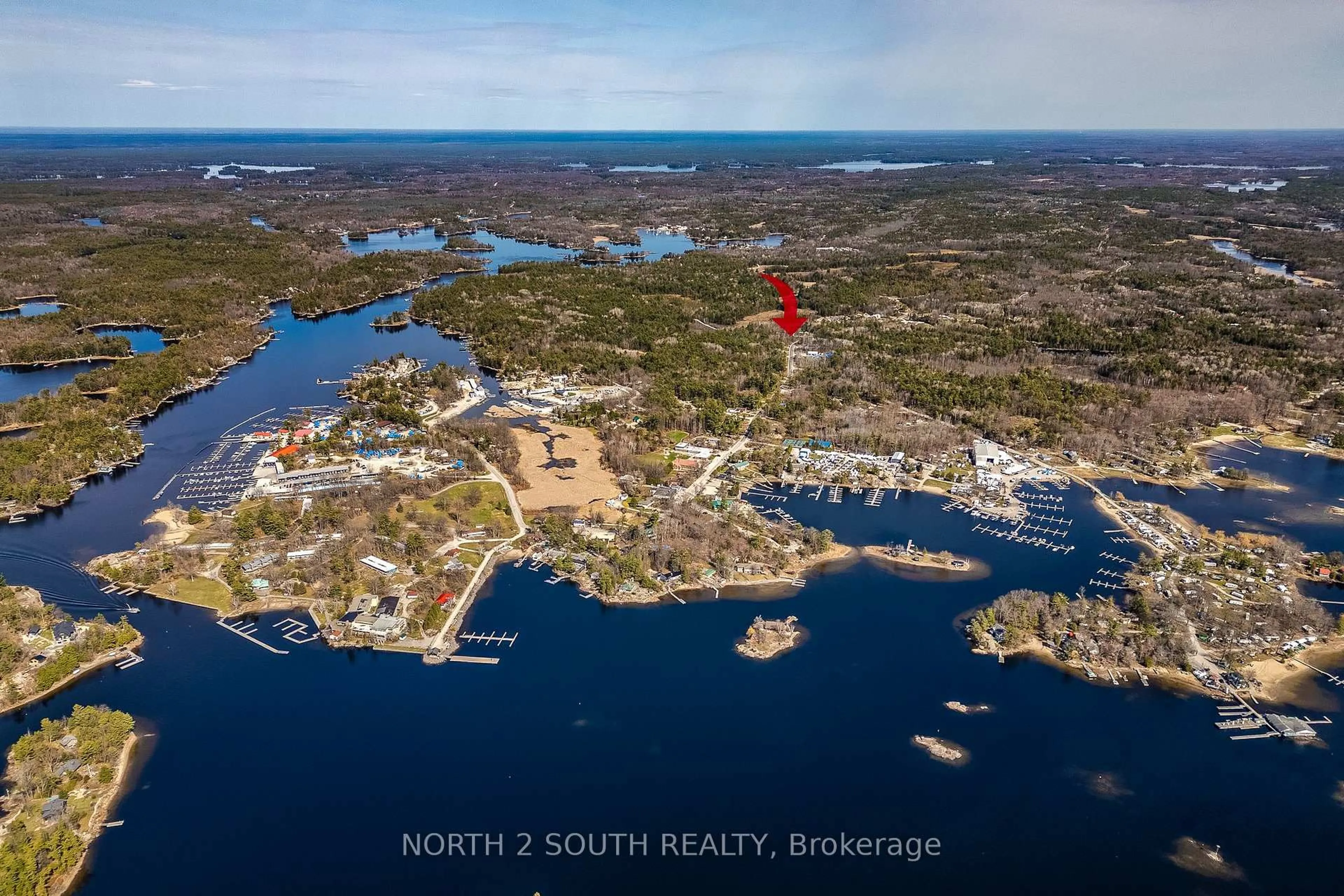 A pic from outside/outdoor area/front of a property/back of a property/a pic from drone, water/lake/river/ocean view for 2390 Honey Harbour Rd, Georgian Bay Ontario P0E 1E0