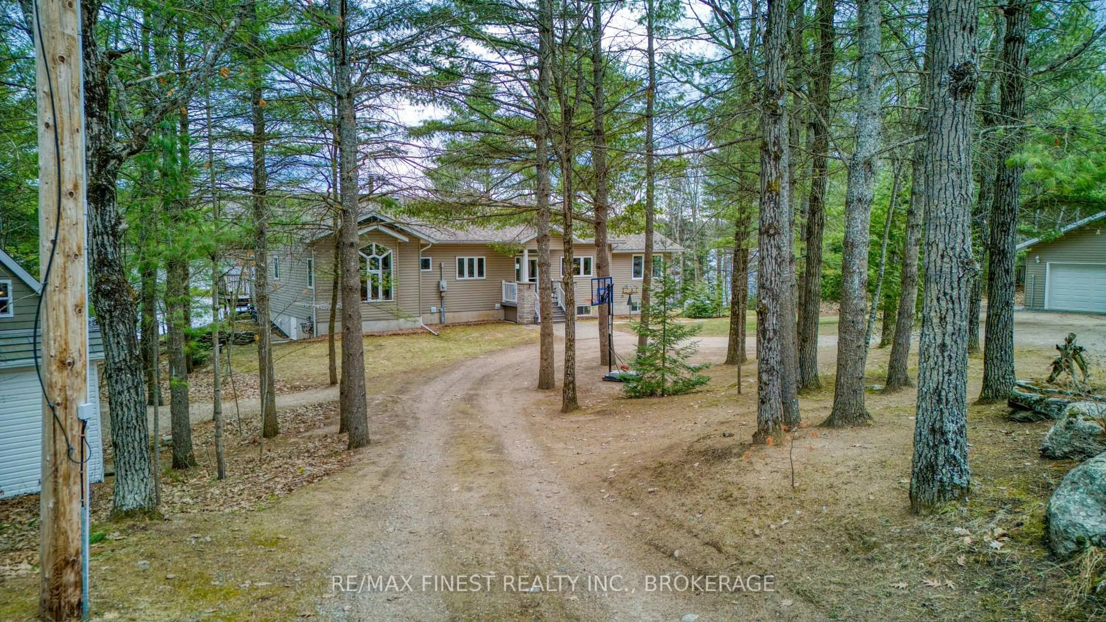 A pic from outside/outdoor area/front of a property/back of a property/a pic from drone, forest/trees view for 1188a Bebris Rd, Arden Ontario K0H 1B0