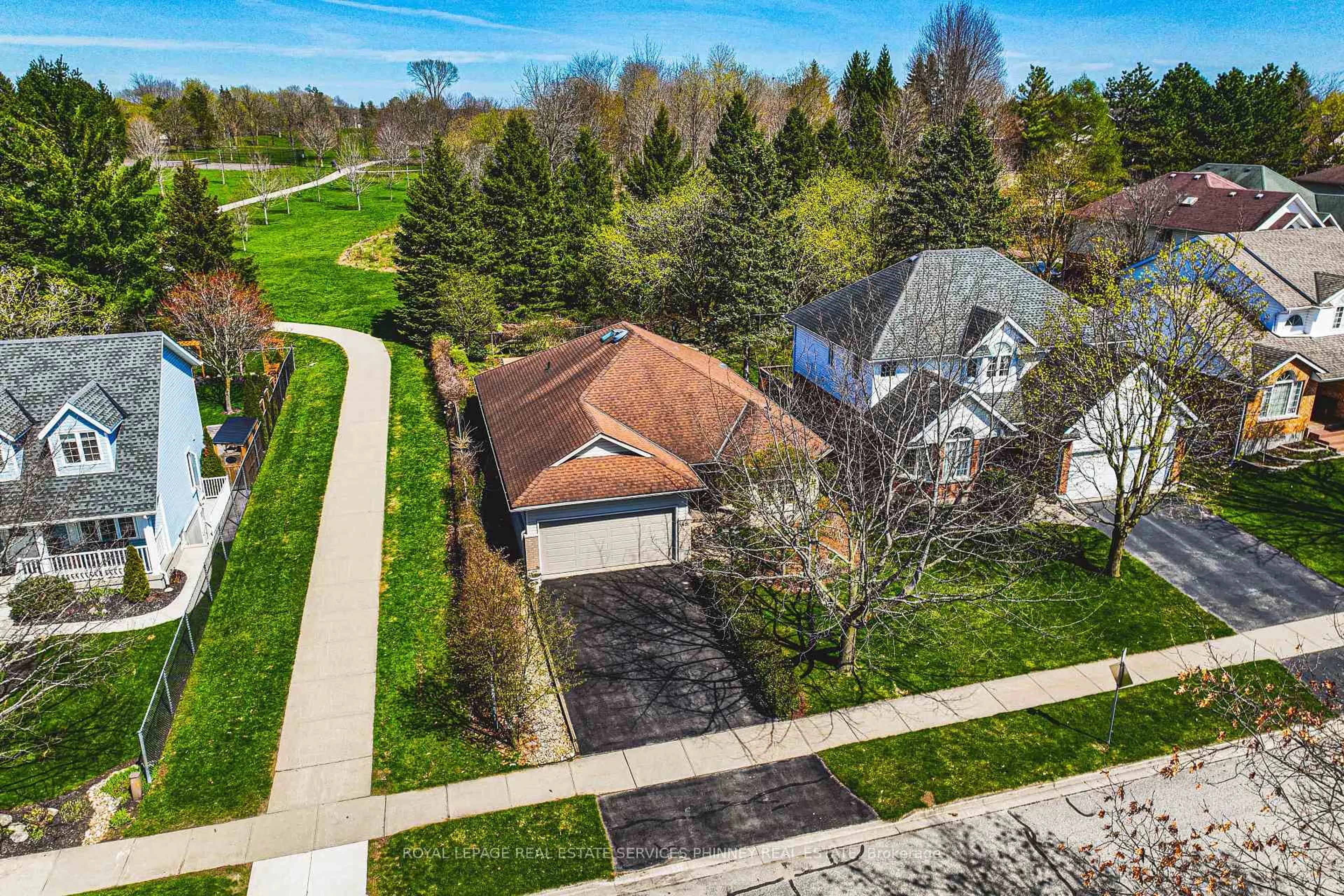 A pic from outside/outdoor area/front of a property/back of a property/a pic from drone, street for 48 Tanager Dr, Guelph Ontario N1C 1B6