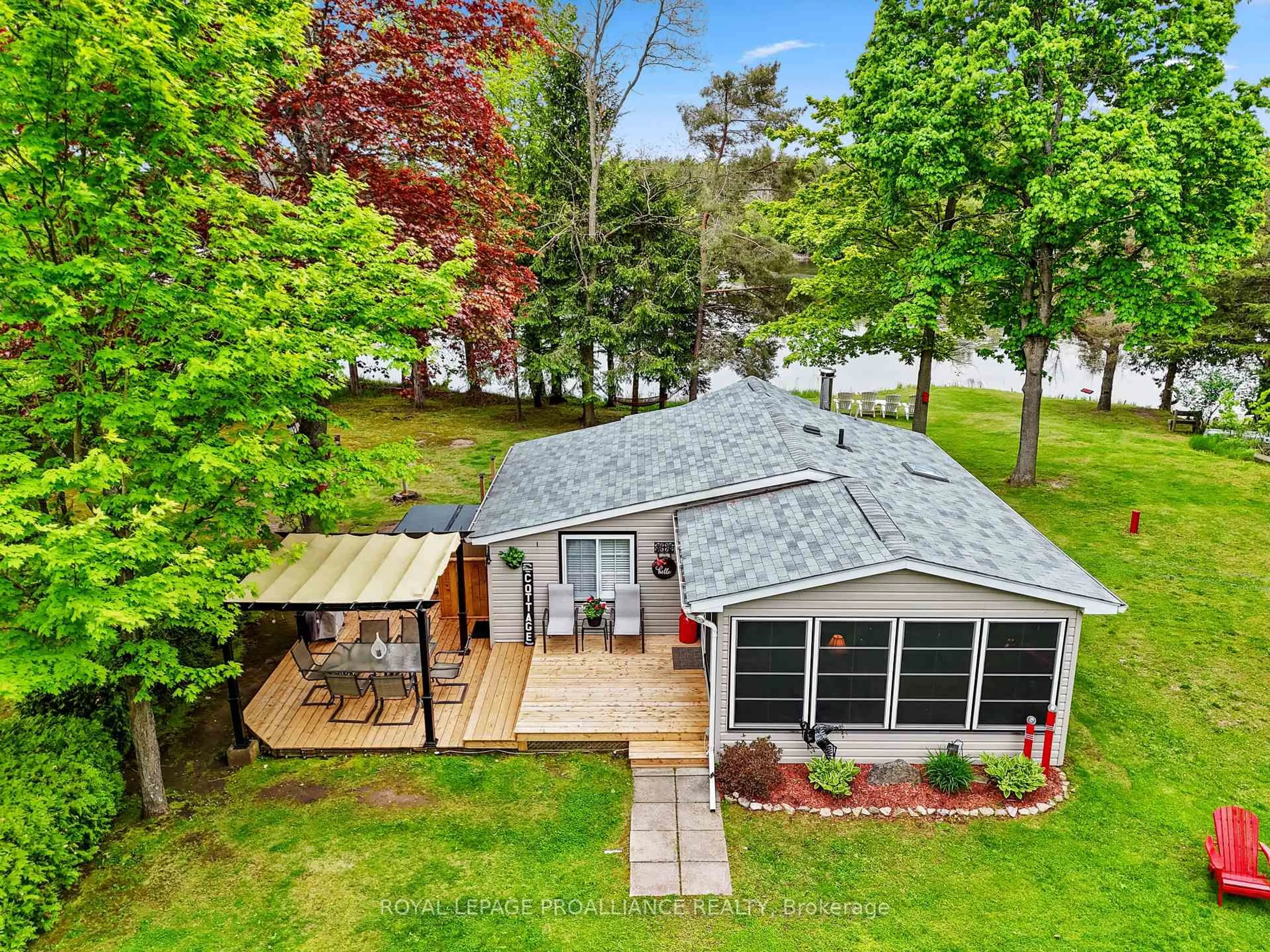 A pic from outside/outdoor area/front of a property/back of a property/a pic from drone, water/lake/river/ocean view for 249 4th Line #A, Trent Hills Ontario K0L 1L0