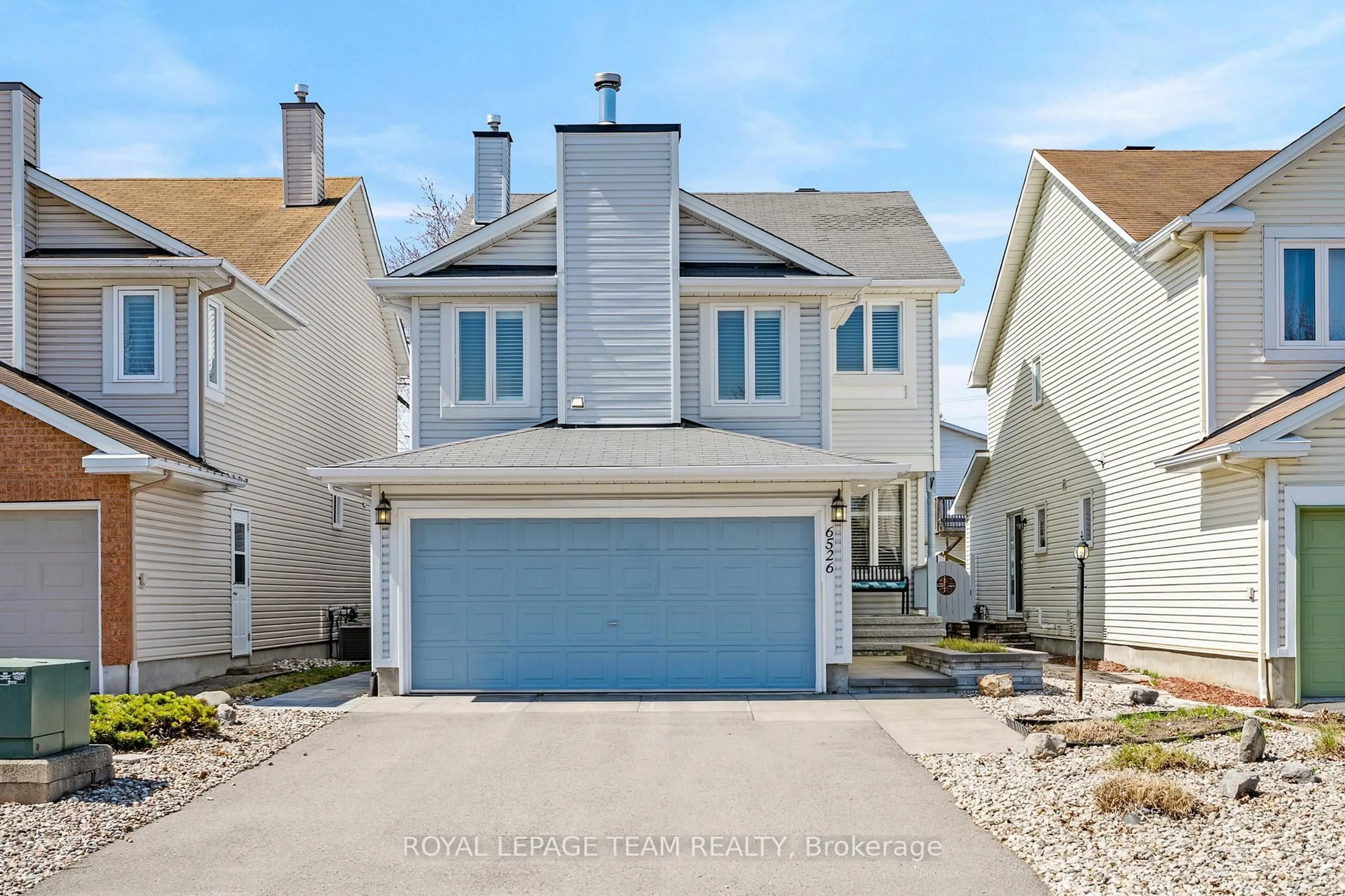 Home with vinyl exterior material, street for 6526 Tooney Dr, Ottawa Ontario K1C 7G9