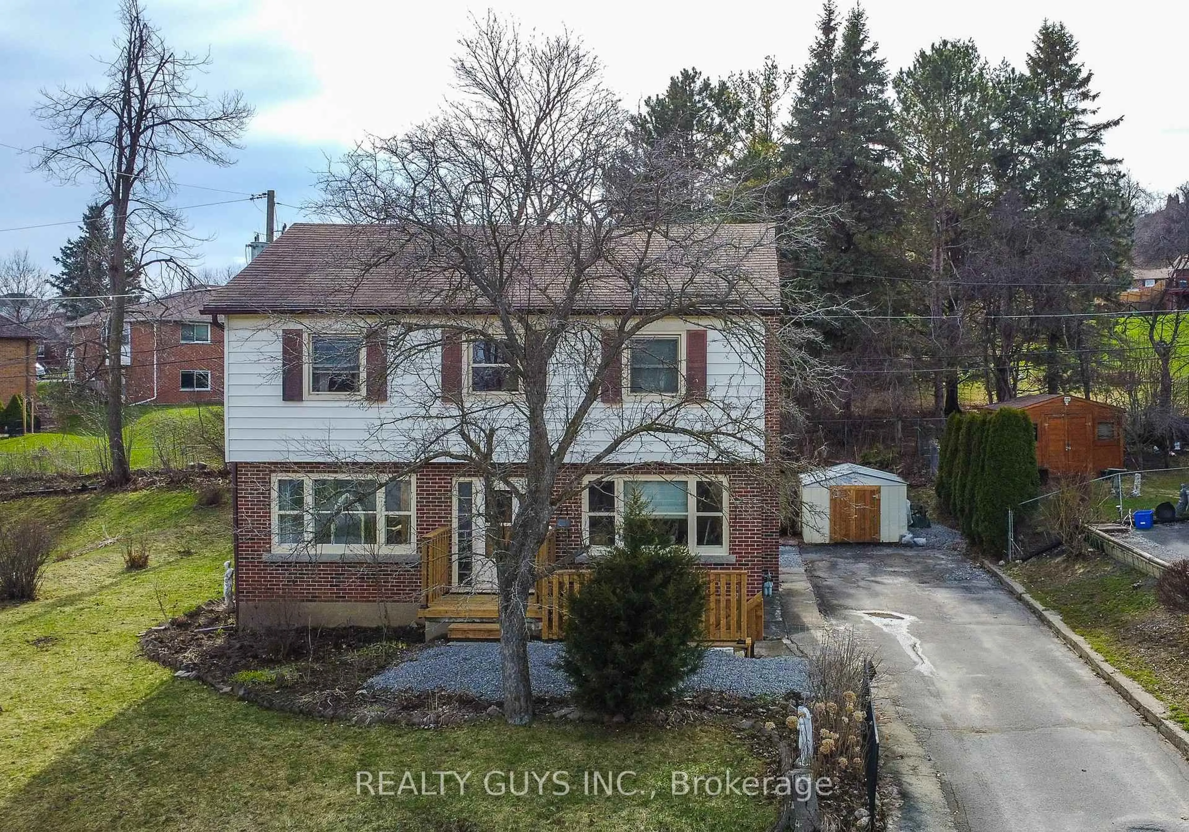 A pic from outside/outdoor area/front of a property/back of a property/a pic from drone, street for 71 Greenhill Dr, Peterborough Ontario K9J 6E2