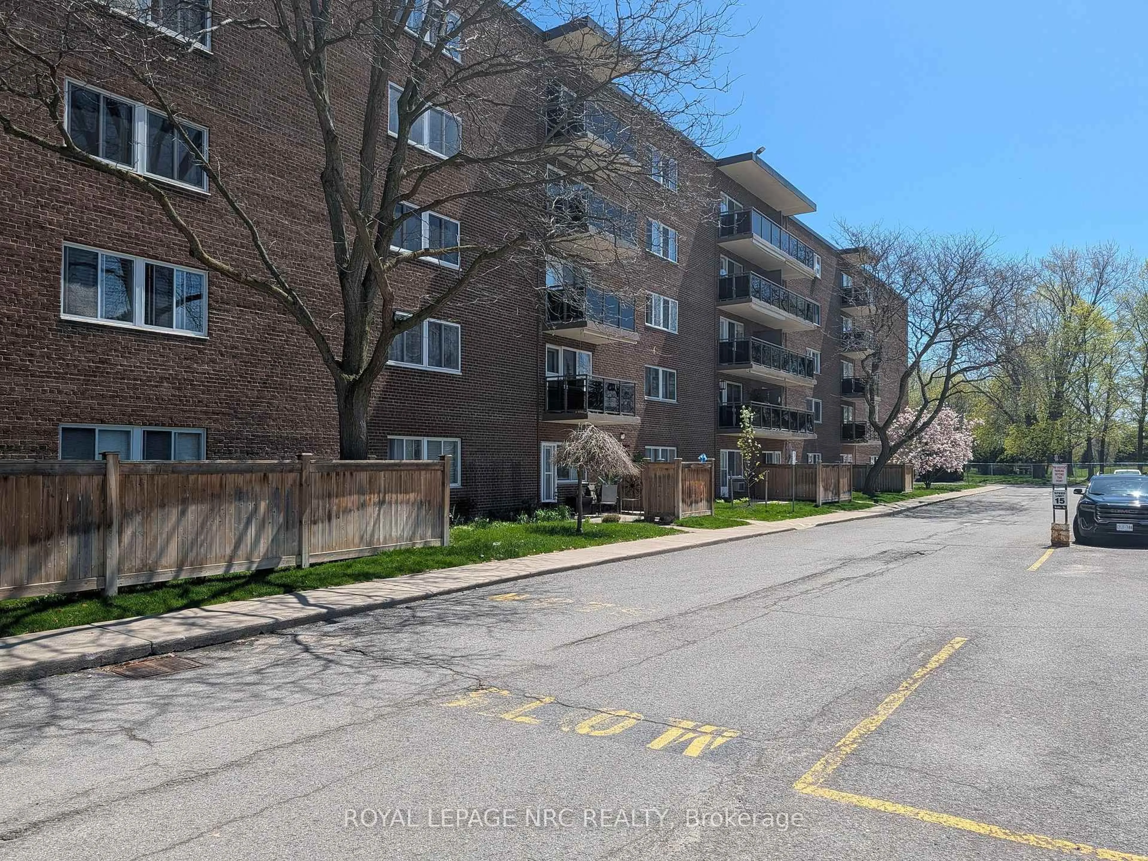 A pic from outside/outdoor area/front of a property/back of a property/a pic from drone, street for 196 Scott St #404, St. Catharines Ontario L2N 5T2