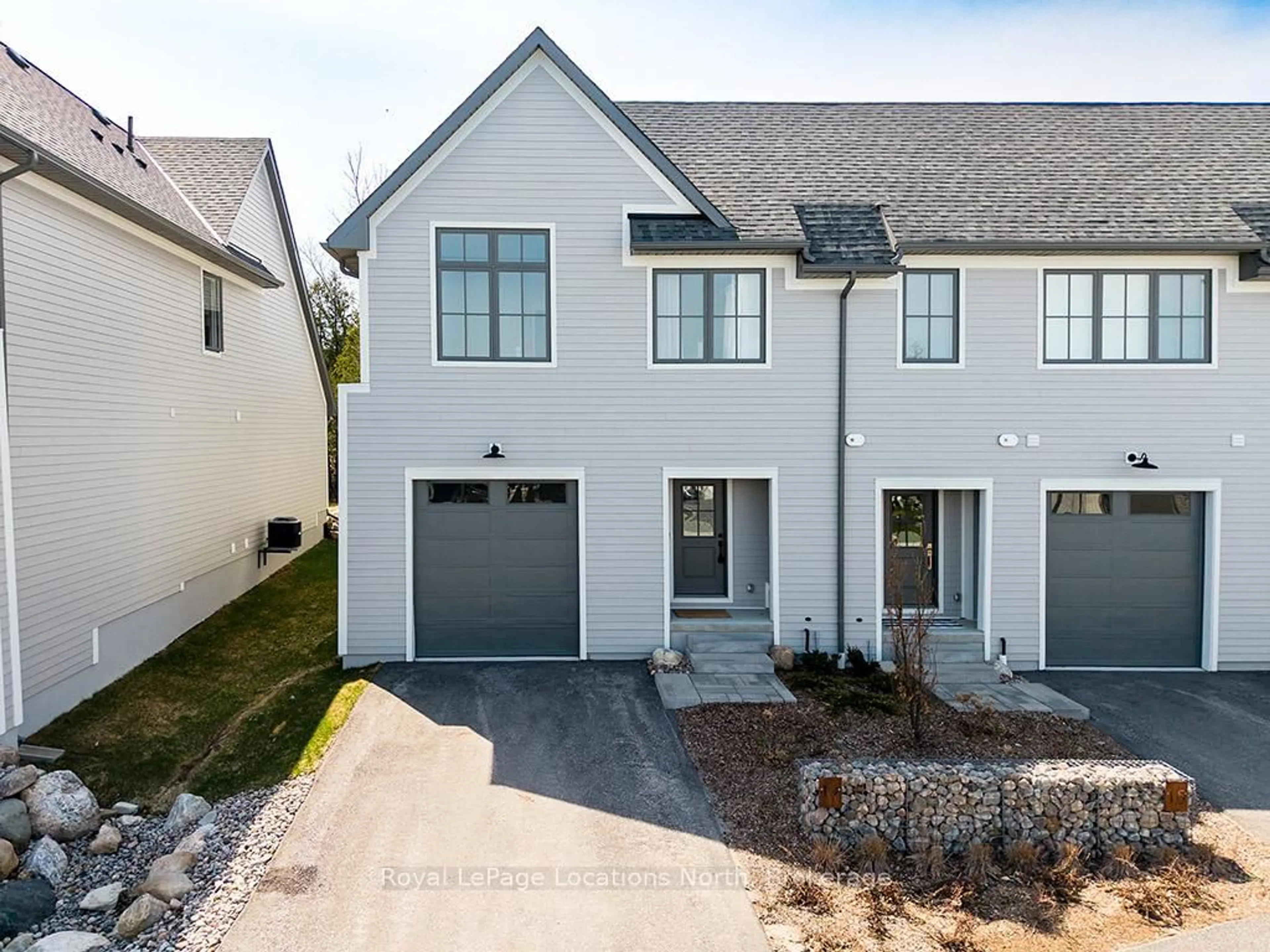 Home with brick exterior material, street for 134 Landry Lane #14, Blue Mountains Ontario N0H 2P0