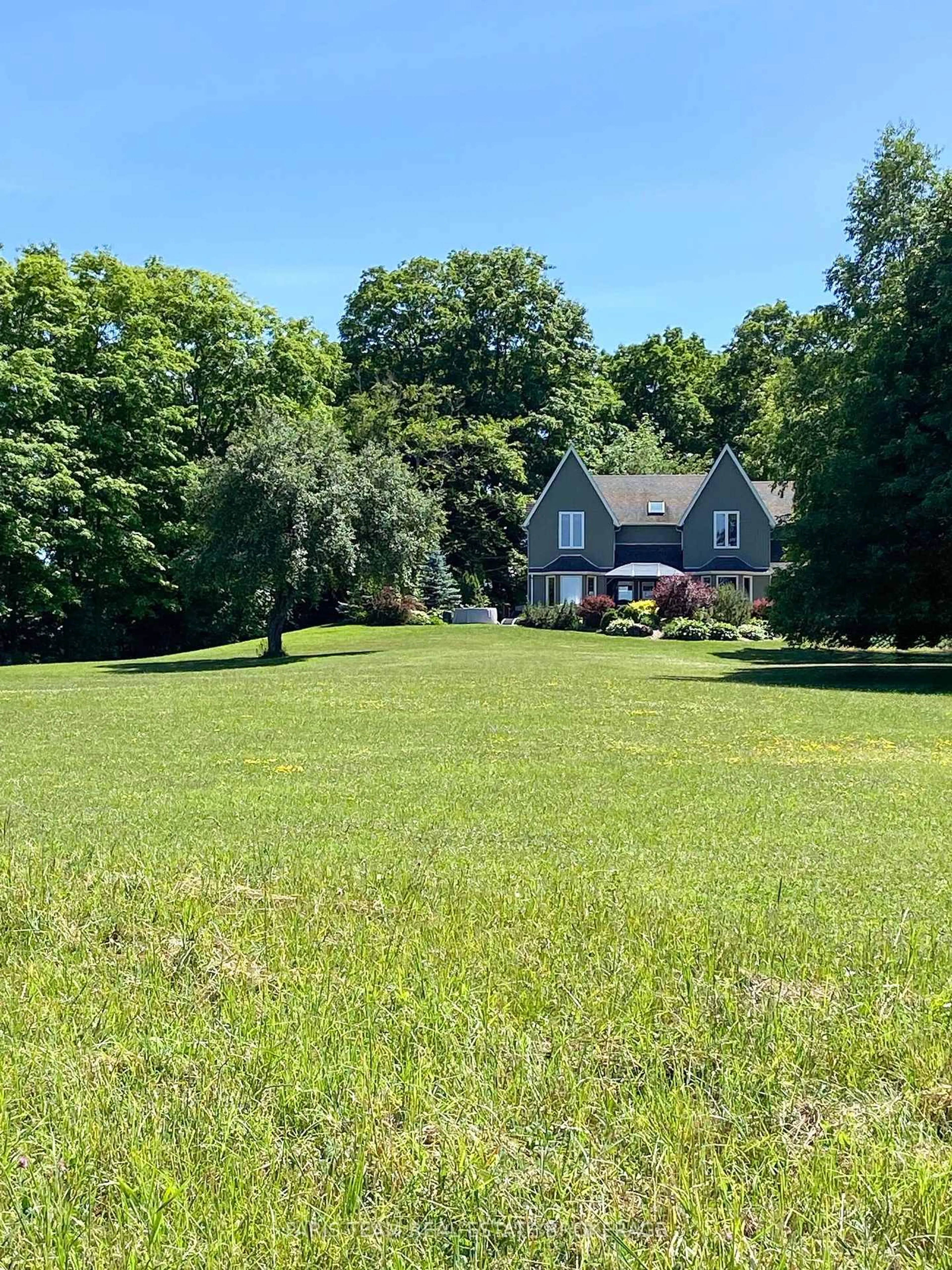 A pic from outside/outdoor area/front of a property/back of a property/a pic from drone, unknown for 714329 Baseline Rd, Grey Highlands Ontario N0C 1E0