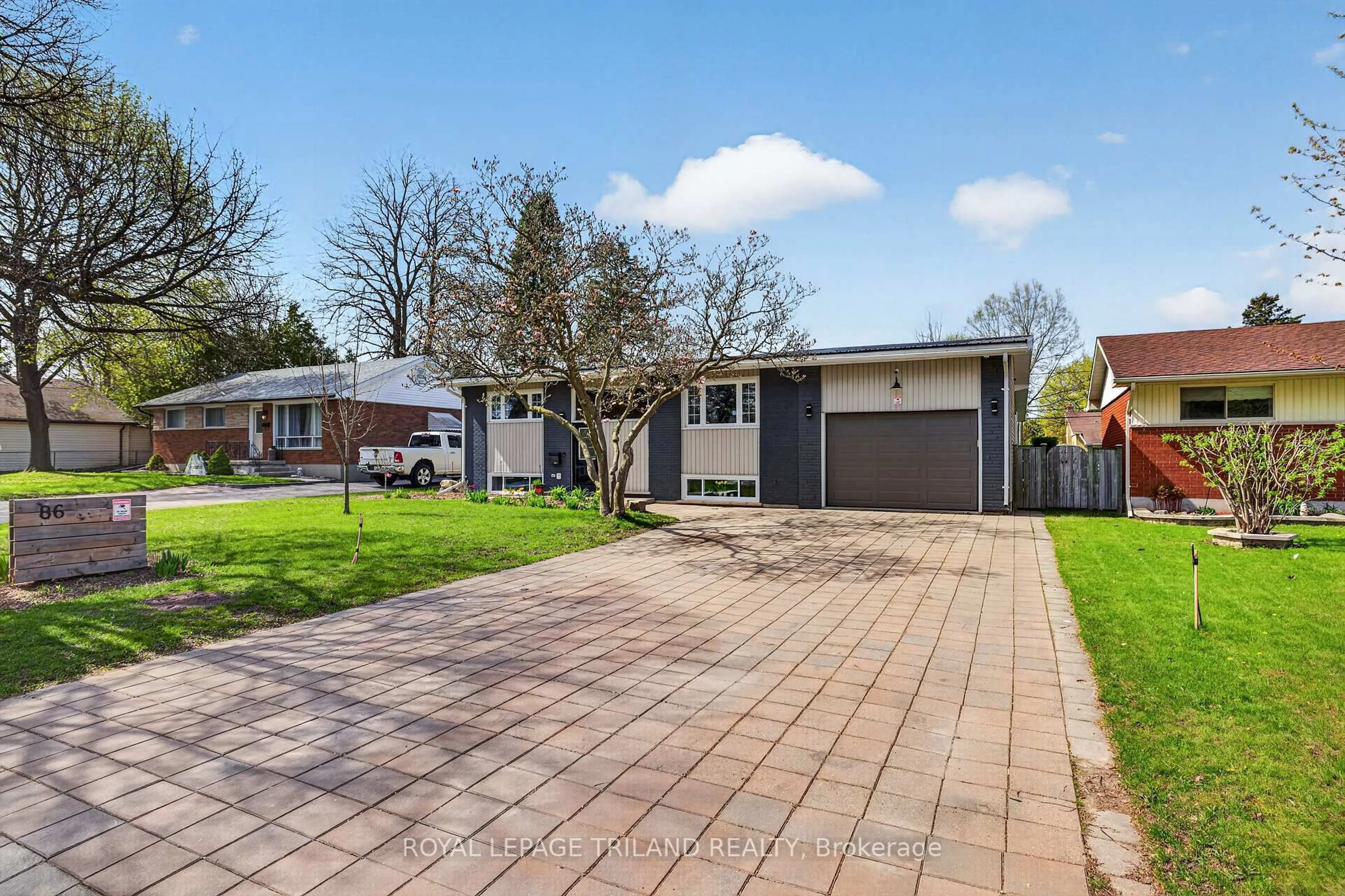 A pic from outside/outdoor area/front of a property/back of a property/a pic from drone, street for 86 Langton Rd, London East Ontario N5V 2M1