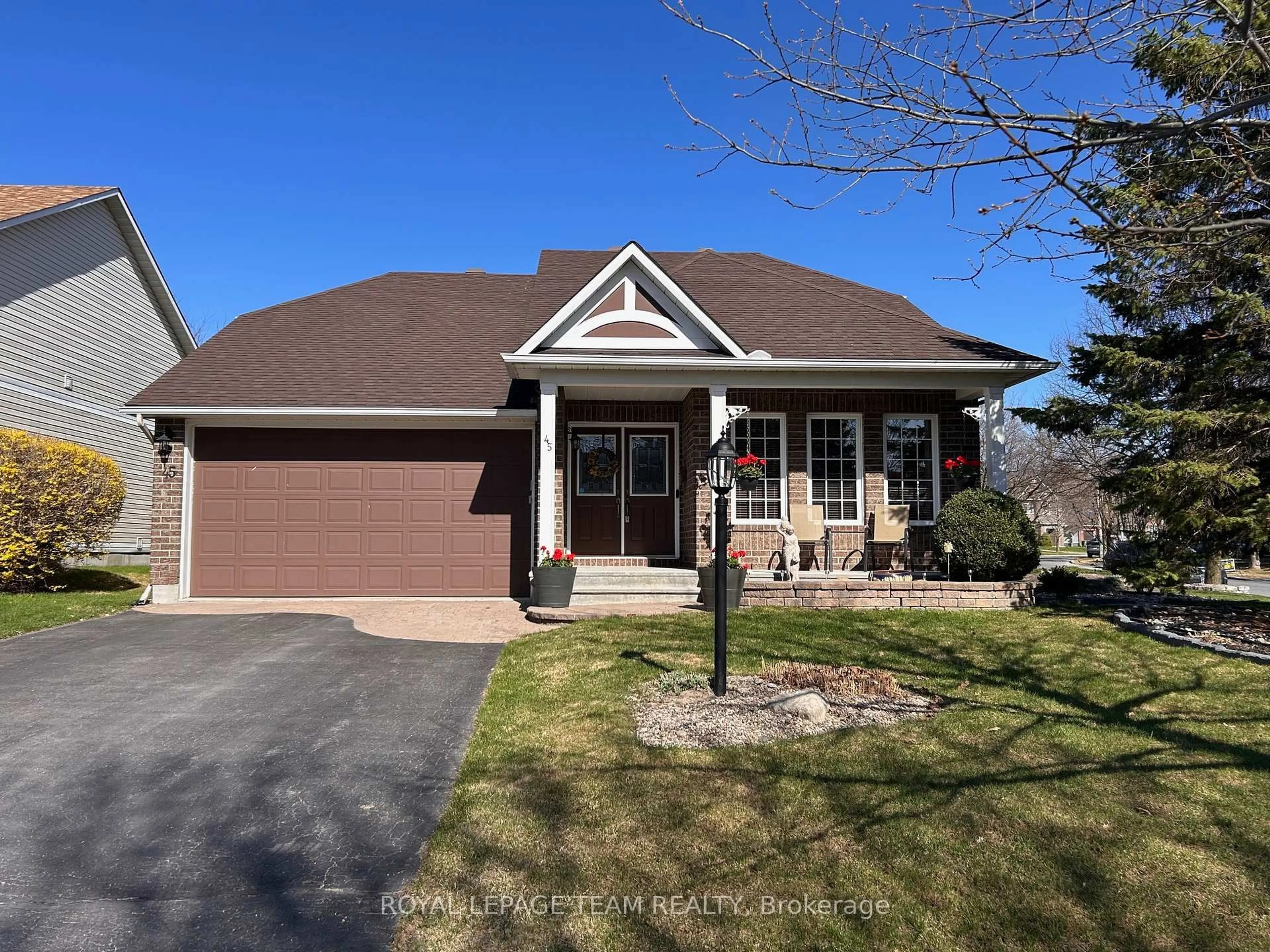 Home with brick exterior material, street for 45 Burnstead Cres, Ottawa Ontario K2M 2T4