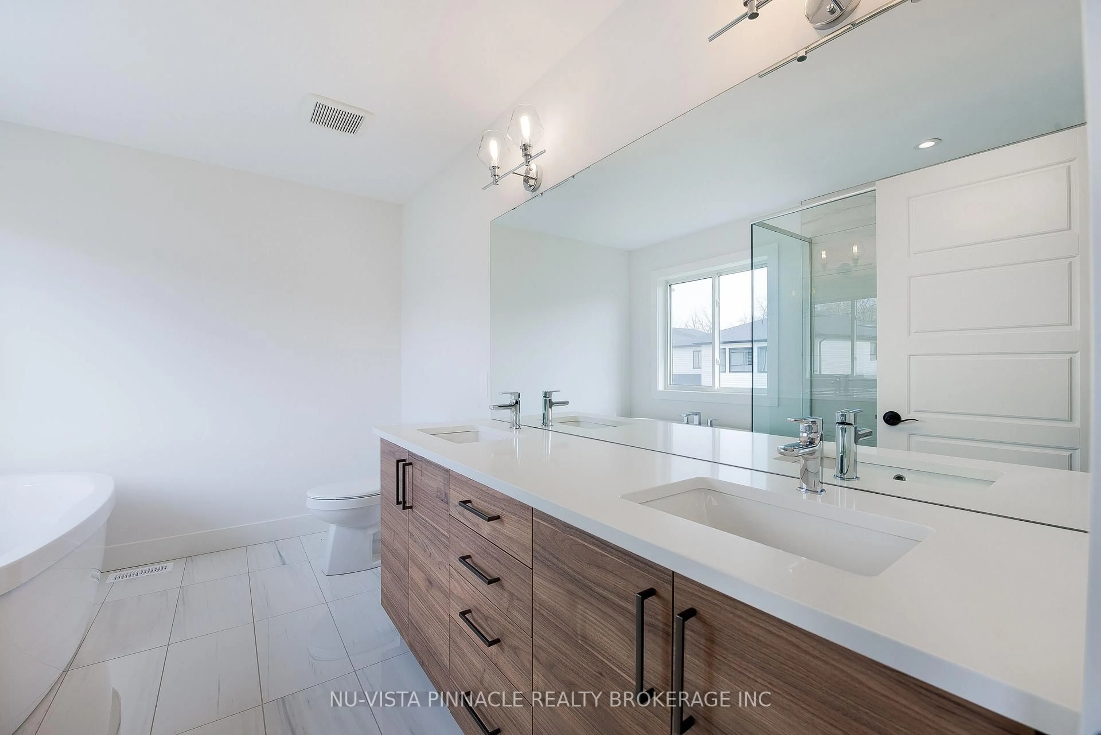 Contemporary bathroom, ceramic/tile floor for 1689 Brayford Ave, London South Ontario N6K 0H1