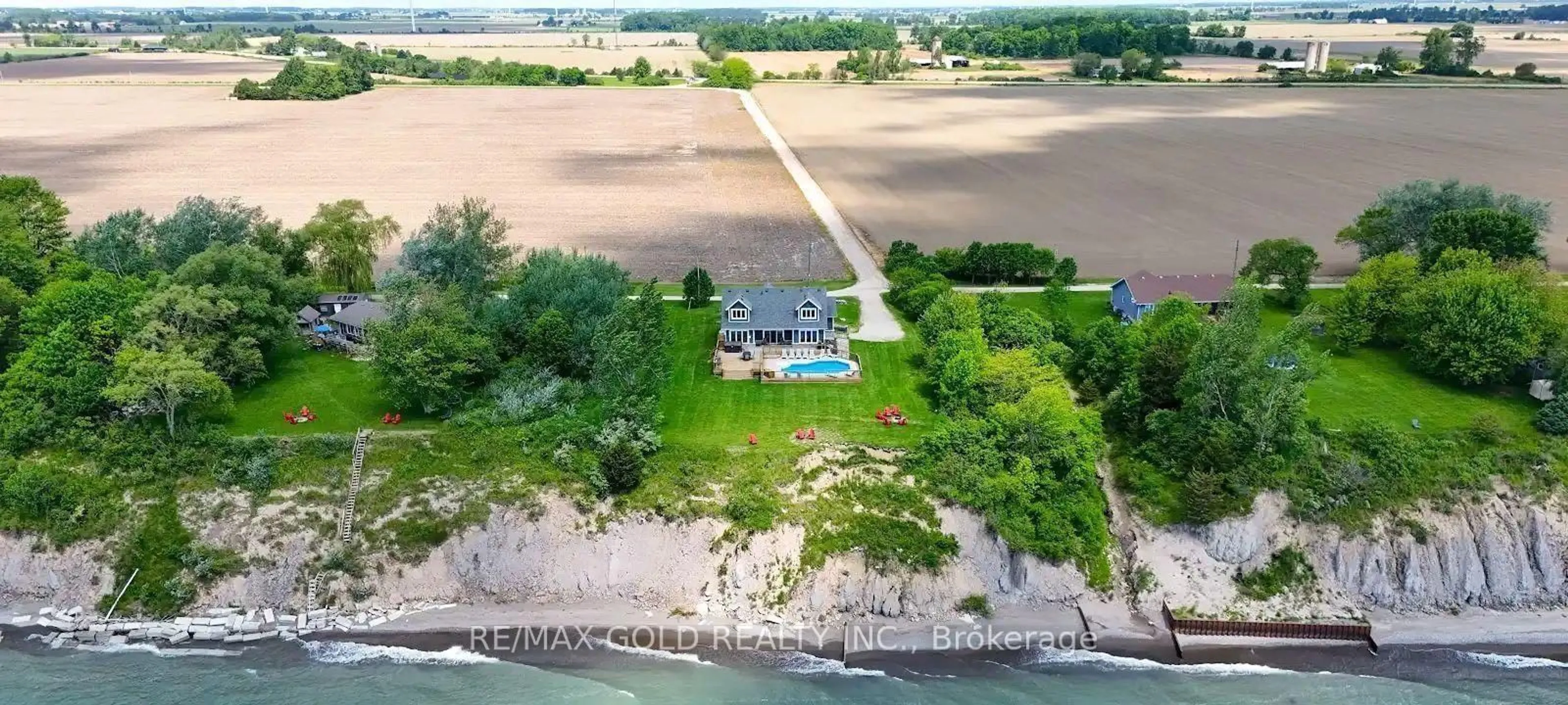 A pic from outside/outdoor area/front of a property/back of a property/a pic from drone, water/lake/river/ocean view for 1932 Ocean Blvd, Chatham-Kent Ontario N0P 2P0
