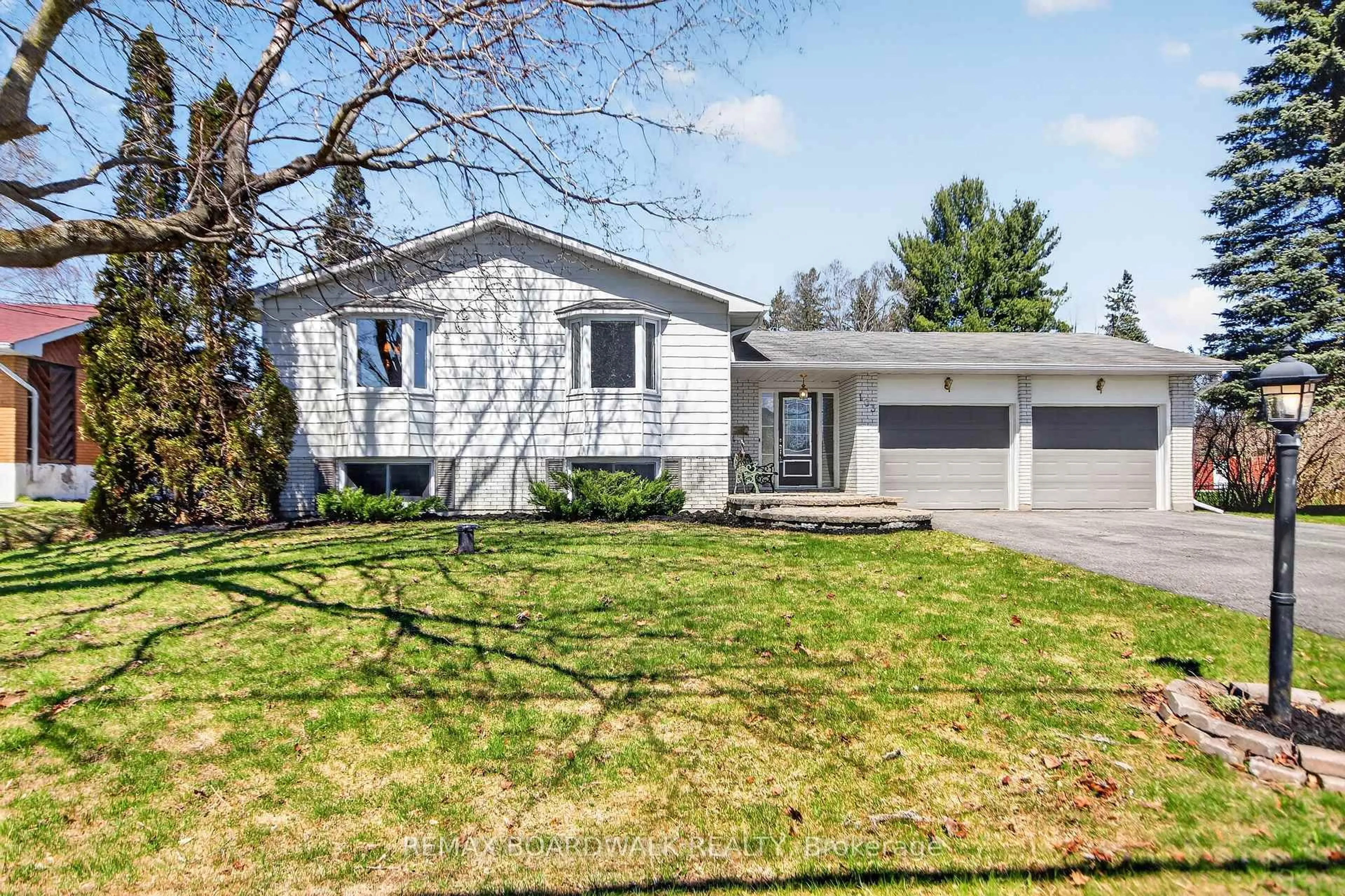 Home with vinyl exterior material, street for 103 Christopher Hamilton St, Richmond Ontario K0A 2Z0