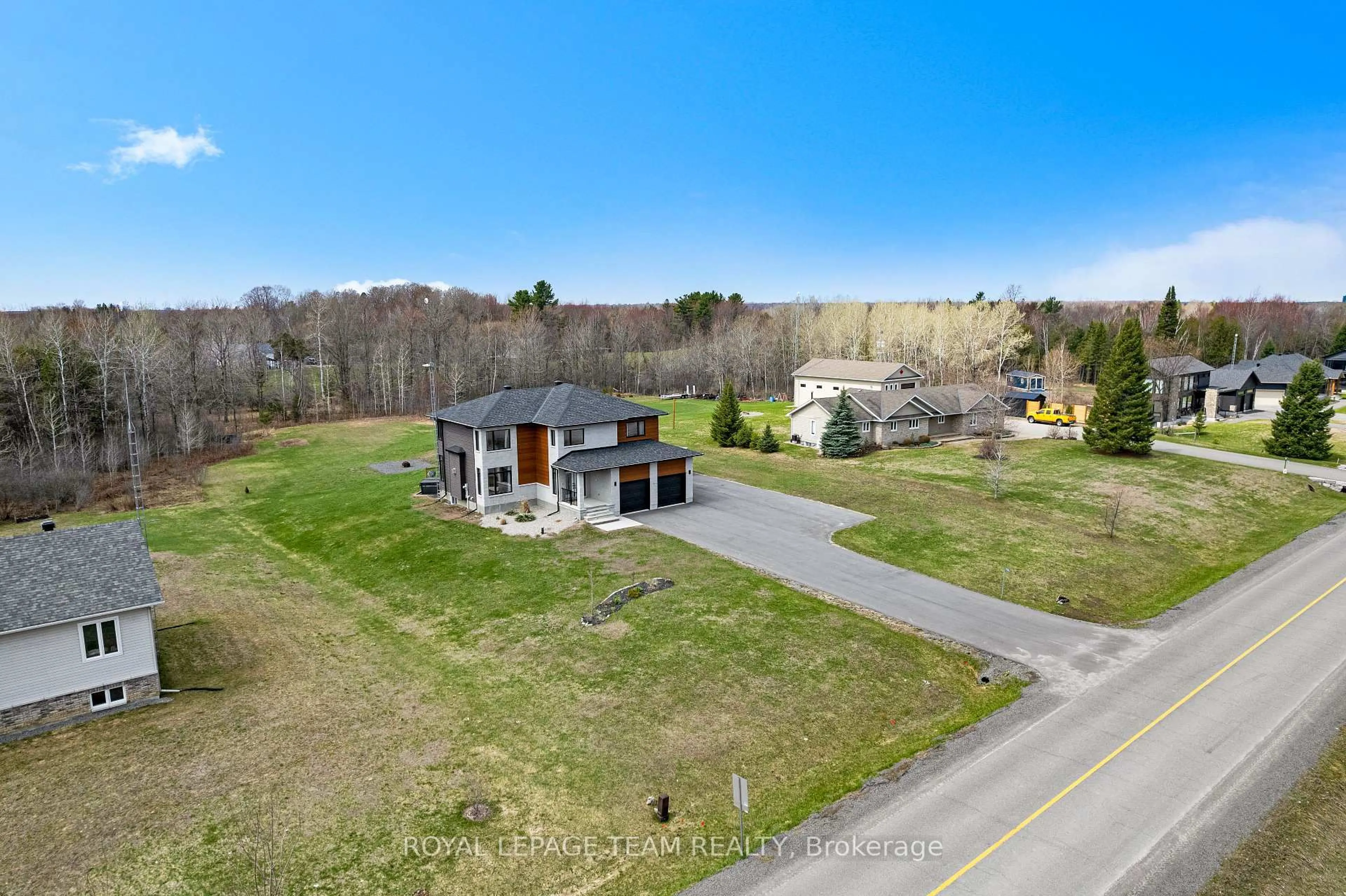 A pic from outside/outdoor area/front of a property/back of a property/a pic from drone, unknown for 114 Smith Rd, North Grenville Ontario K0G 1T0