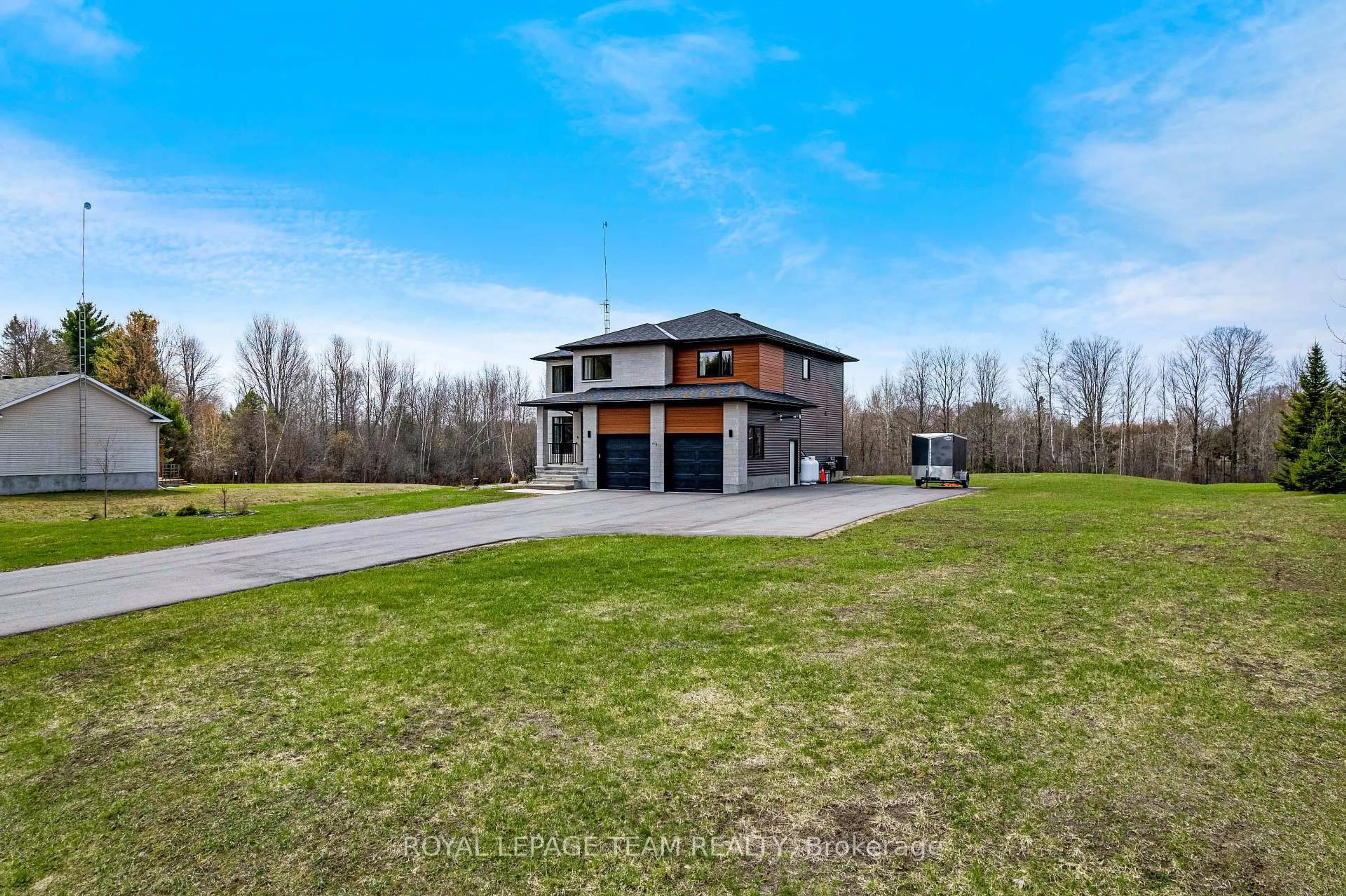 A pic from outside/outdoor area/front of a property/back of a property/a pic from drone, water/lake/river/ocean view for 114 Smith Rd, North Grenville Ontario K0G 1T0