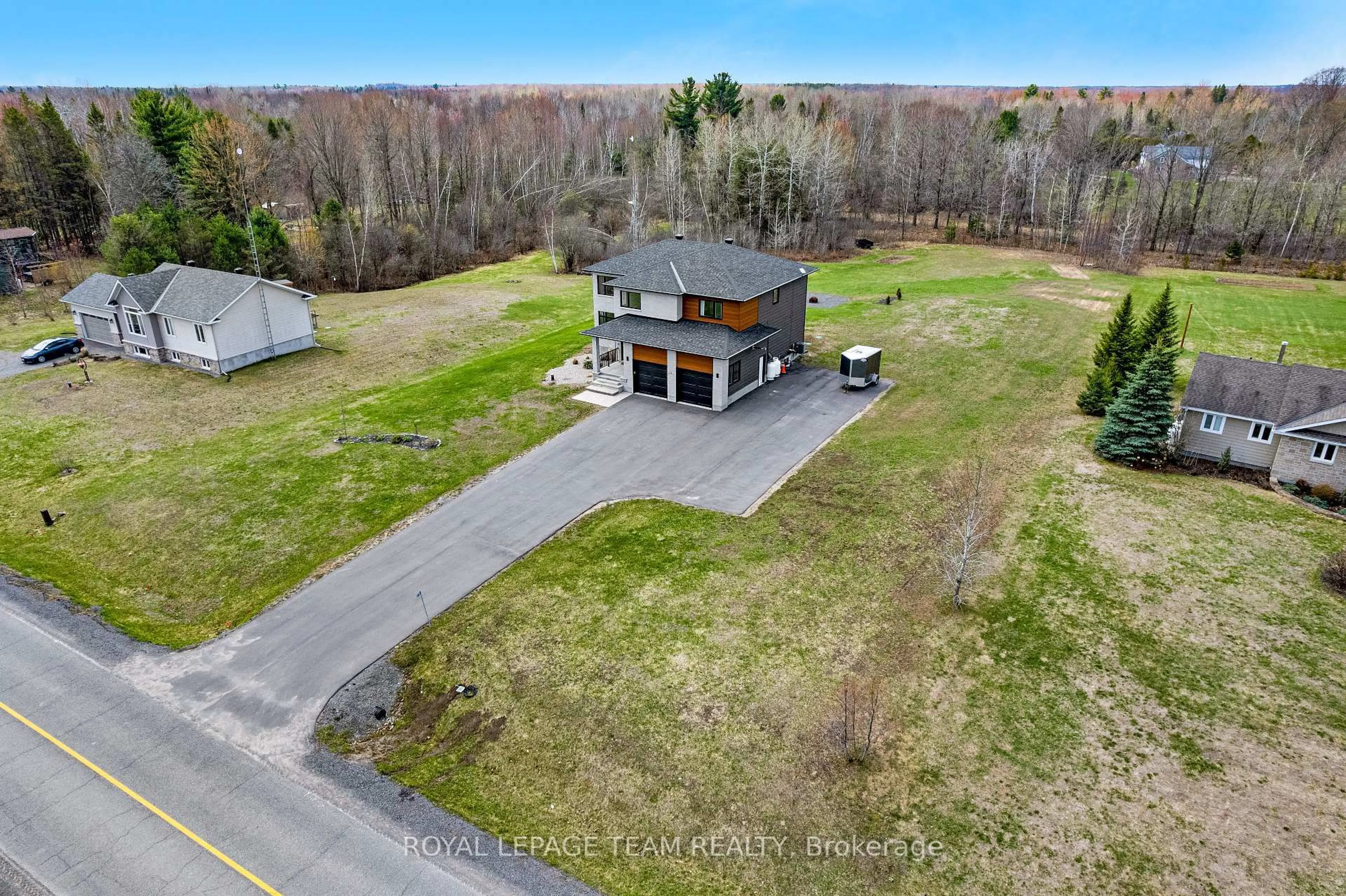A pic from outside/outdoor area/front of a property/back of a property/a pic from drone, unknown for 114 Smith Rd, North Grenville Ontario K0G 1T0