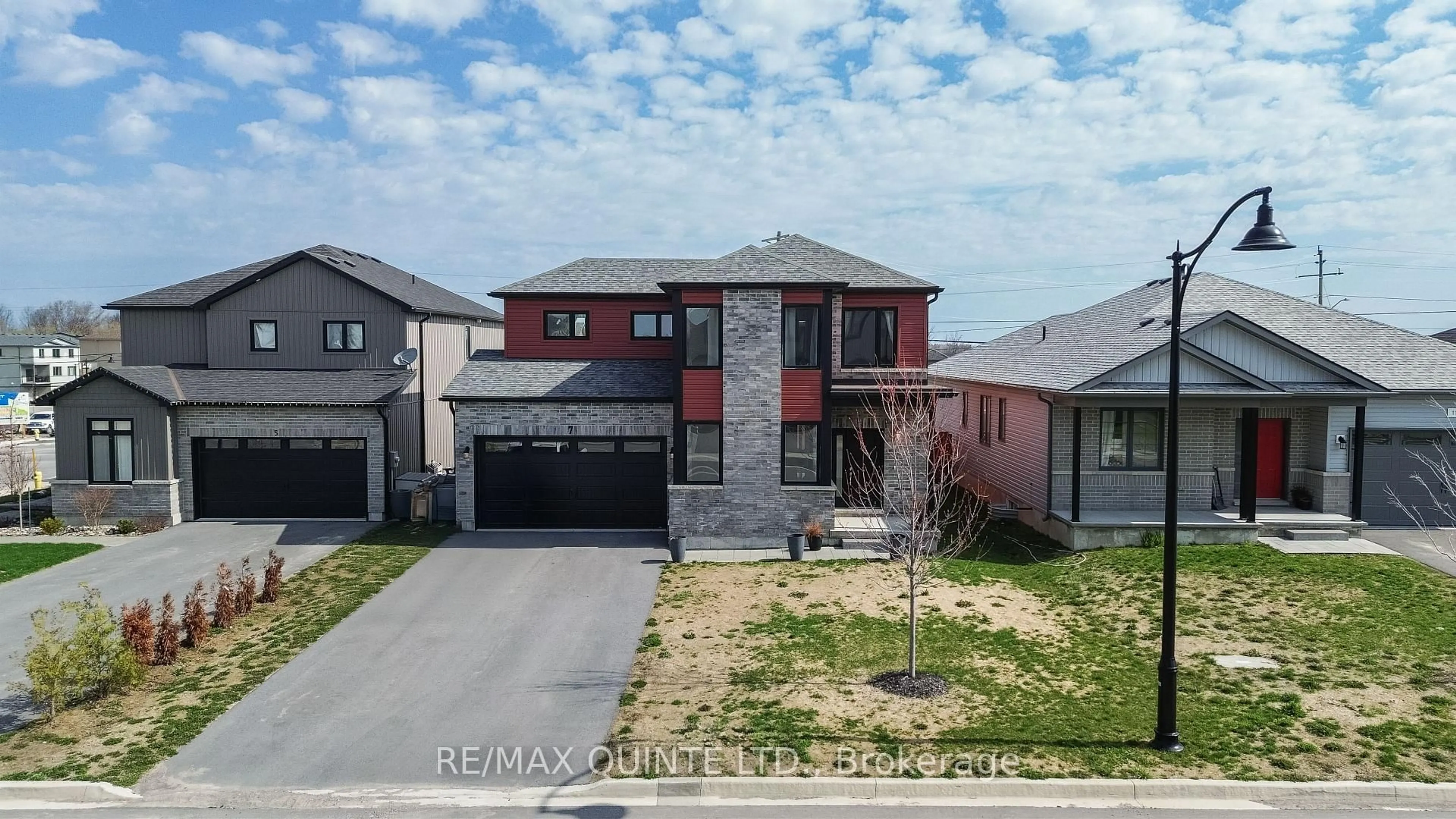 A pic from outside/outdoor area/front of a property/back of a property/a pic from drone, street for 7 Allen St, Prince Edward County Ontario K0K 2T0