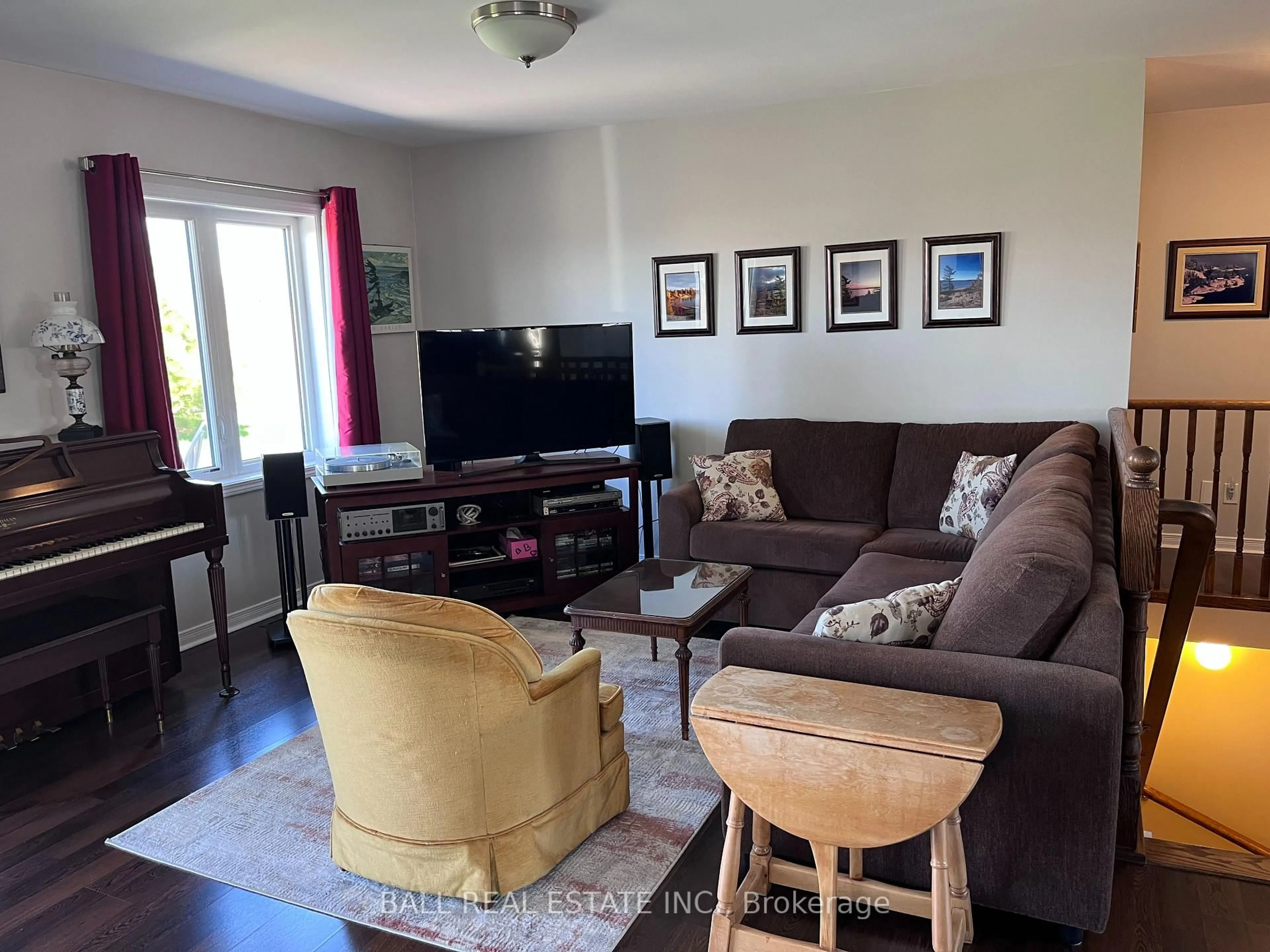 Living room with furniture, wood/laminate floor for 6 Maple Ave, Asphodel-Norwood Ontario K0L 2V0