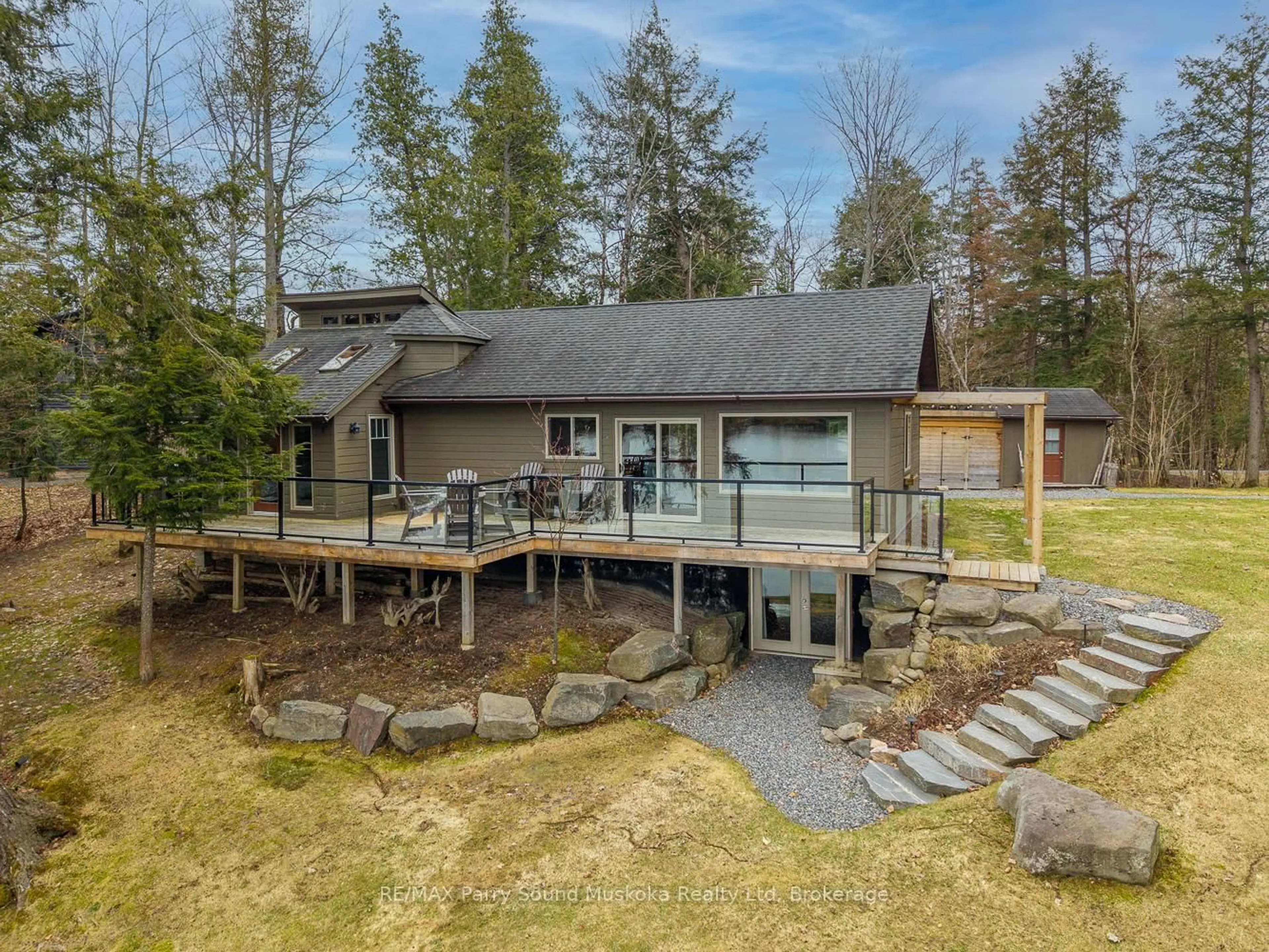 A pic from outside/outdoor area/front of a property/back of a property/a pic from drone, water/lake/river/ocean view for 67 Sunnyshore Park Dr, McKellar Ontario P2A 0B5