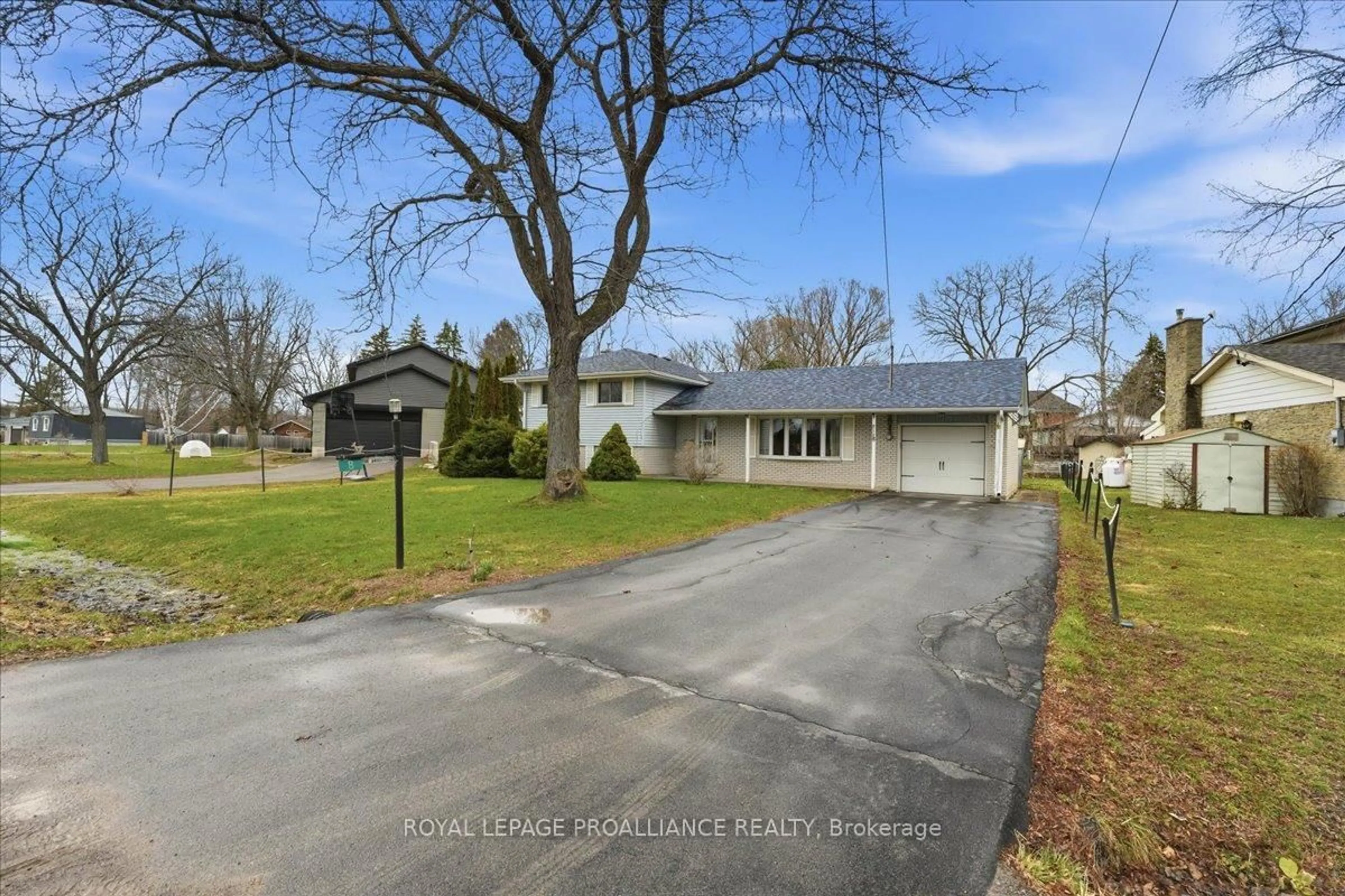 A pic from outside/outdoor area/front of a property/back of a property/a pic from drone, street for 8 Fenwood Cres, Prince Edward County Ontario K8N 4Z7