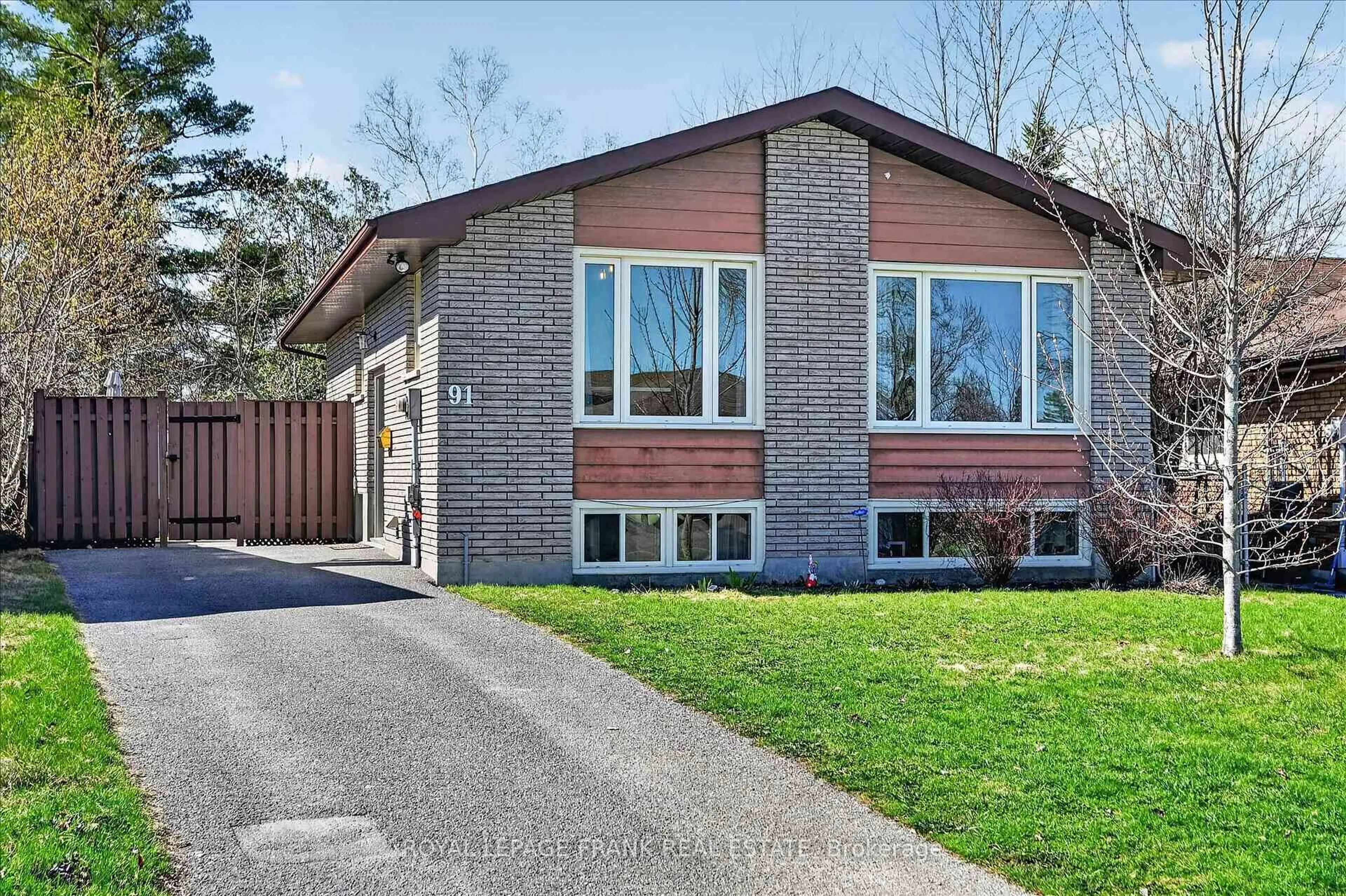 Home with brick exterior material, street for 91 Rideau Cres, Peterborough Ontario K9J 1G7