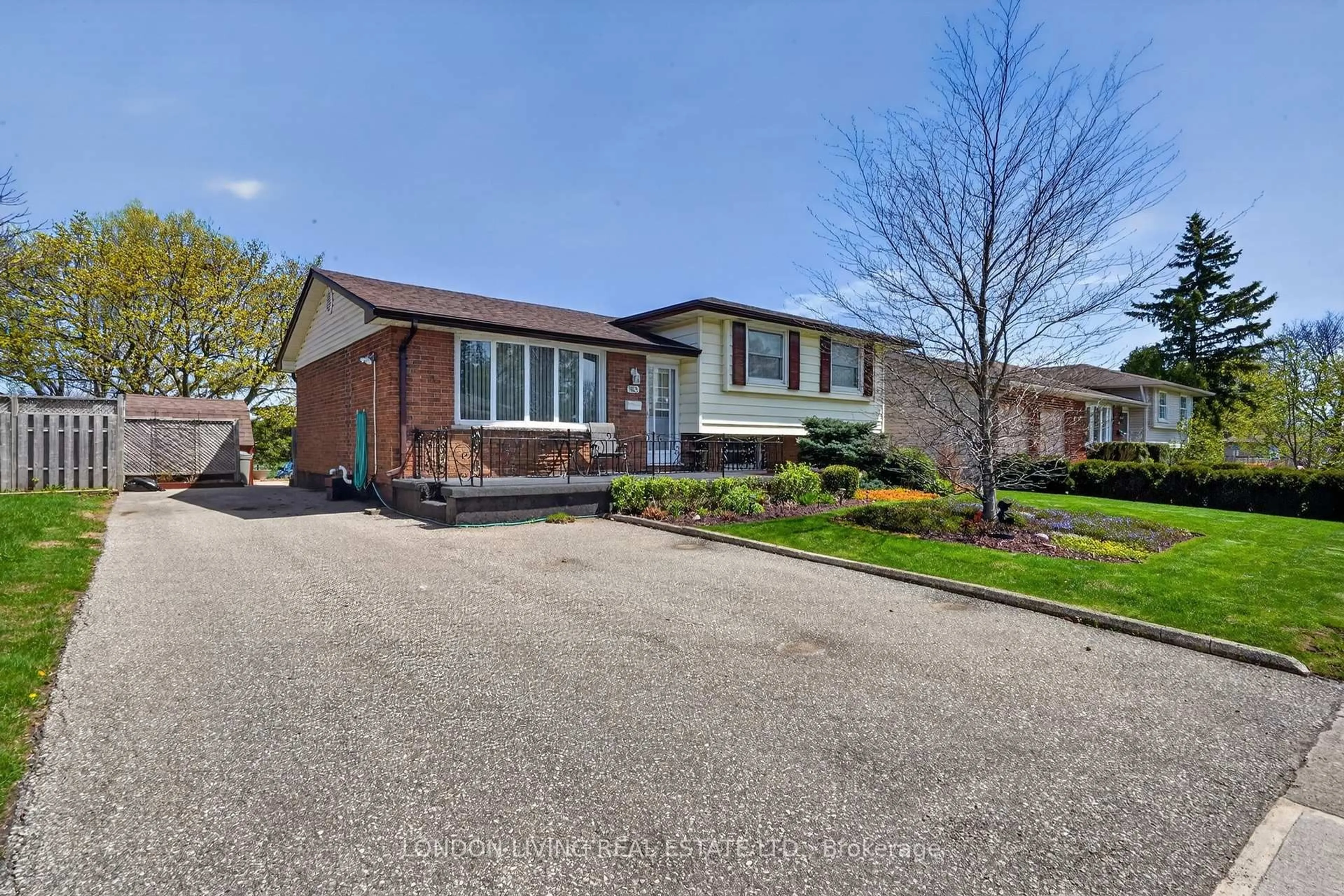 Home with brick exterior material, street for 965 Osgoode Dr, London South Ontario N6E 1C9