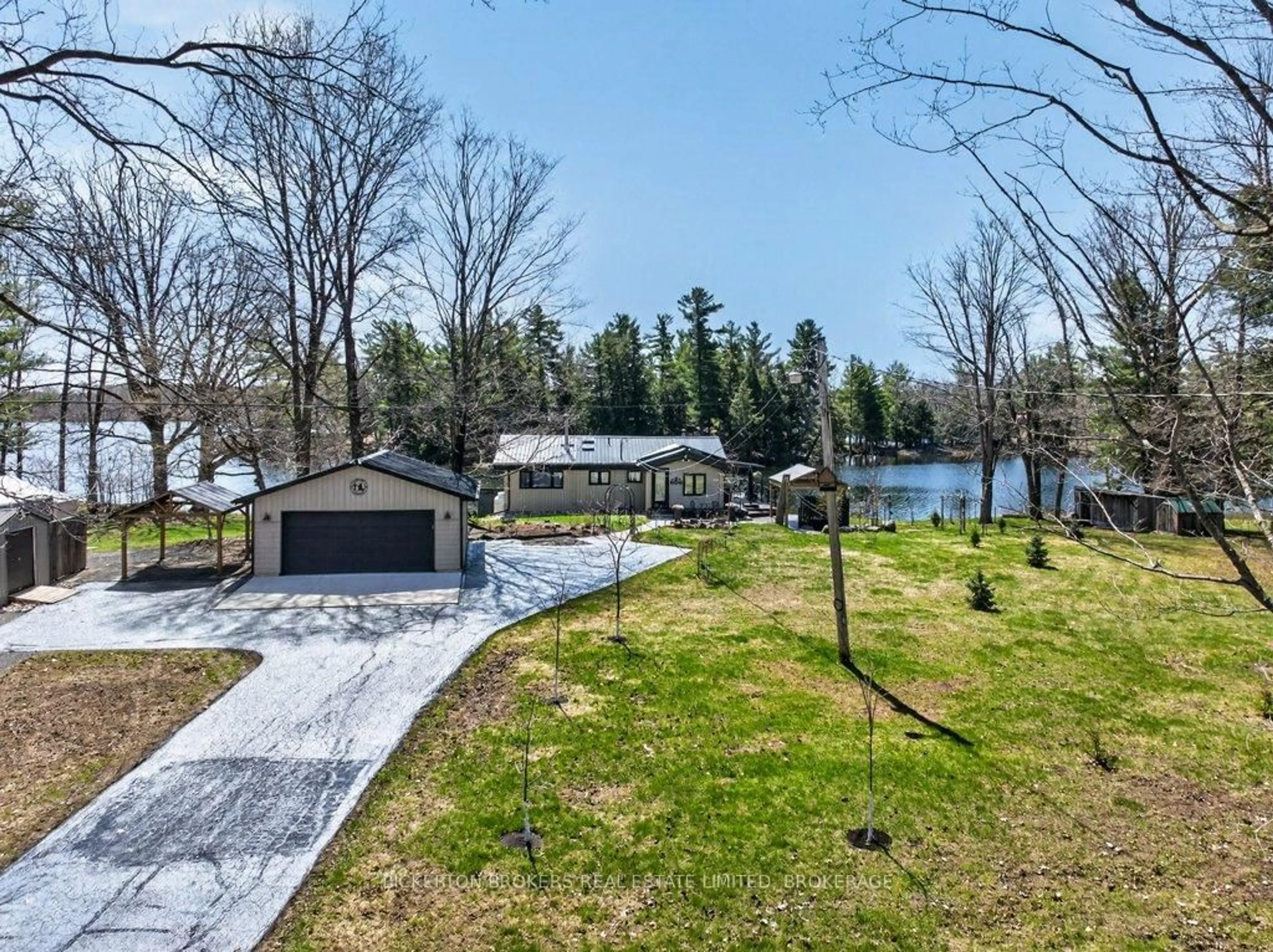 A pic from outside/outdoor area/front of a property/back of a property/a pic from drone, water/lake/river/ocean view for 1927 Hogan Rd, Perth Road Ontario K0H 2L0