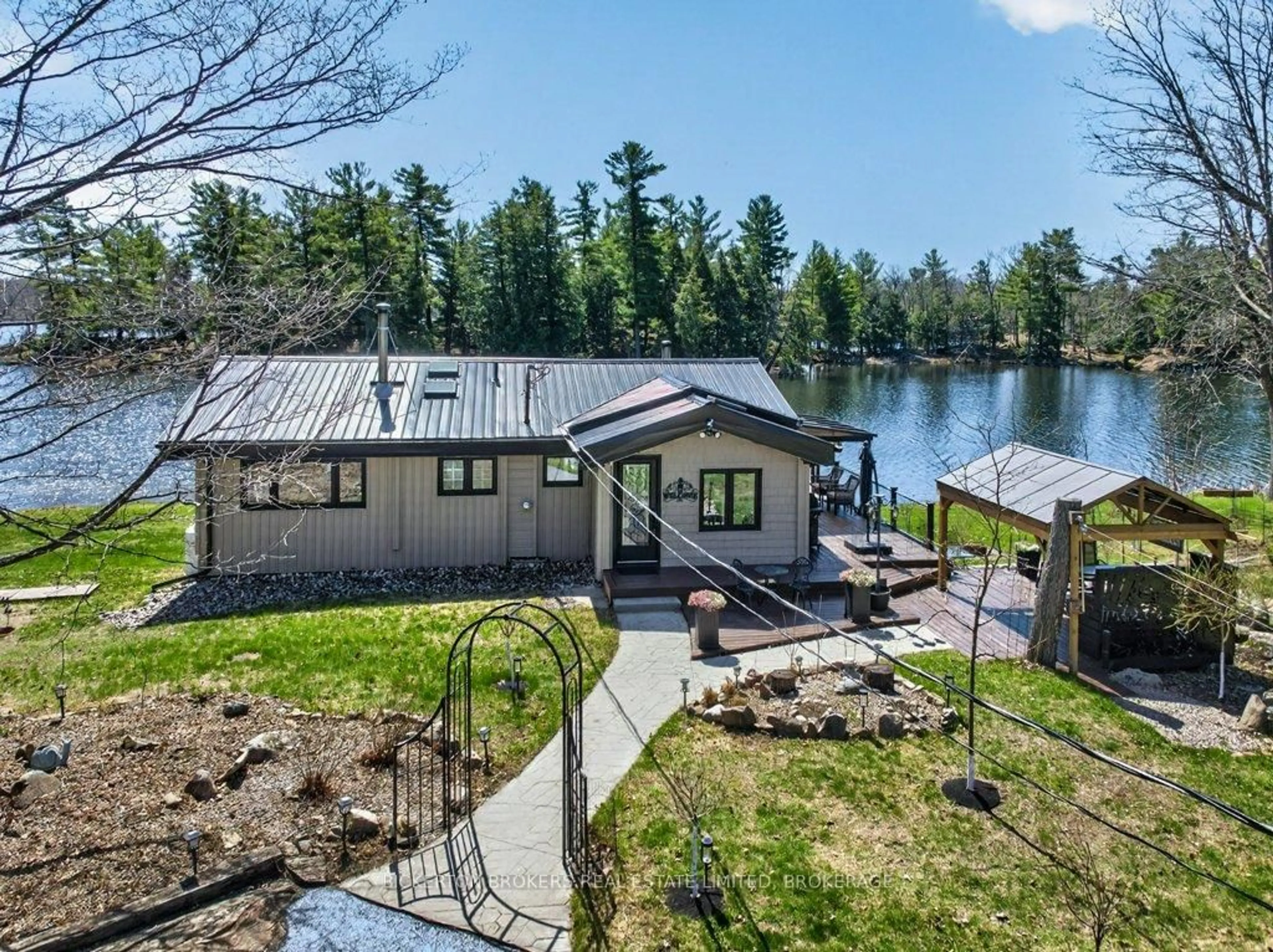 A pic from outside/outdoor area/front of a property/back of a property/a pic from drone, water/lake/river/ocean view for 1927 Hogan Rd, Perth Road Ontario K0H 2L0