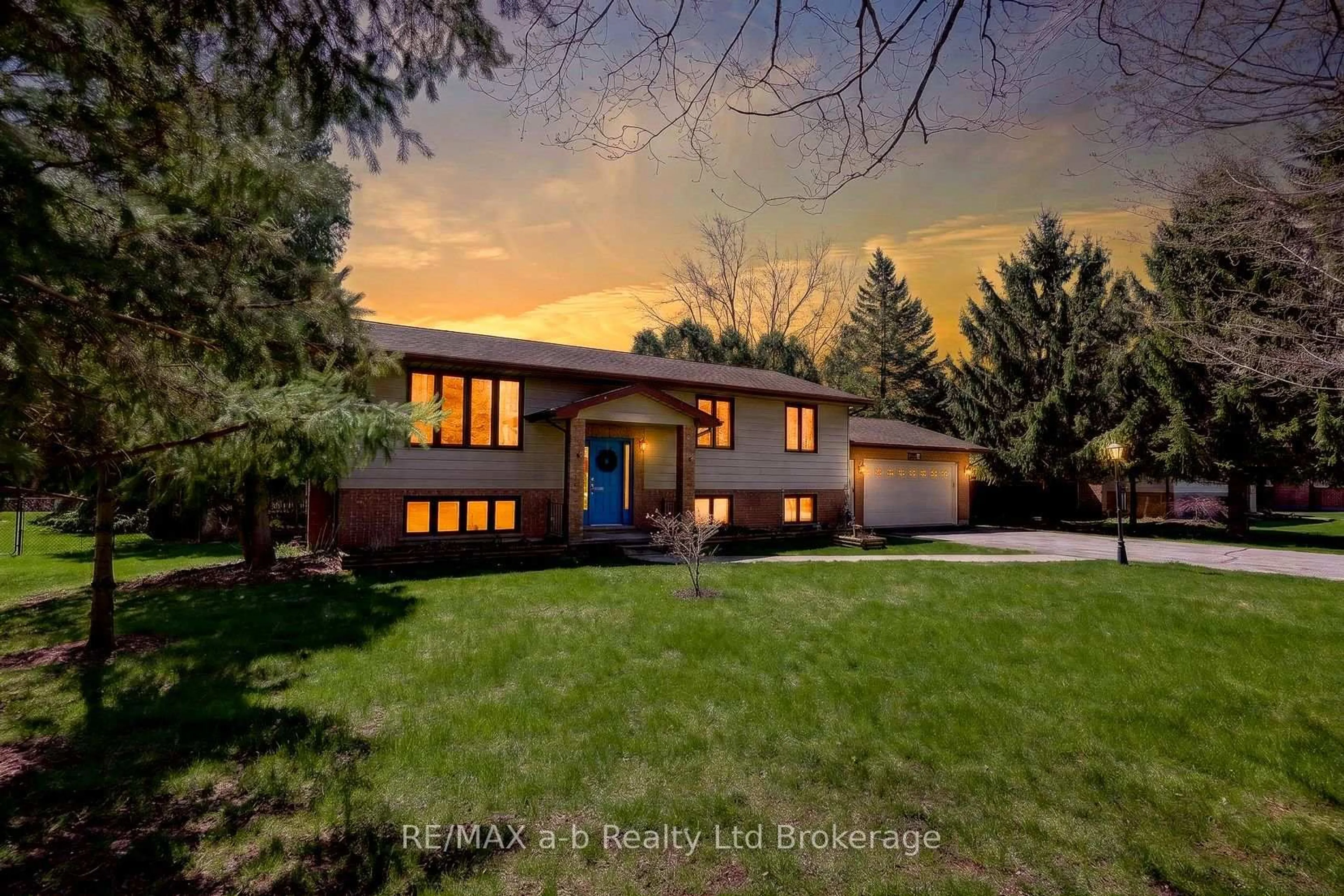 Home with brick exterior material, street for 2487 Mossley Dr, Thames Centre Ontario N0L 1V0