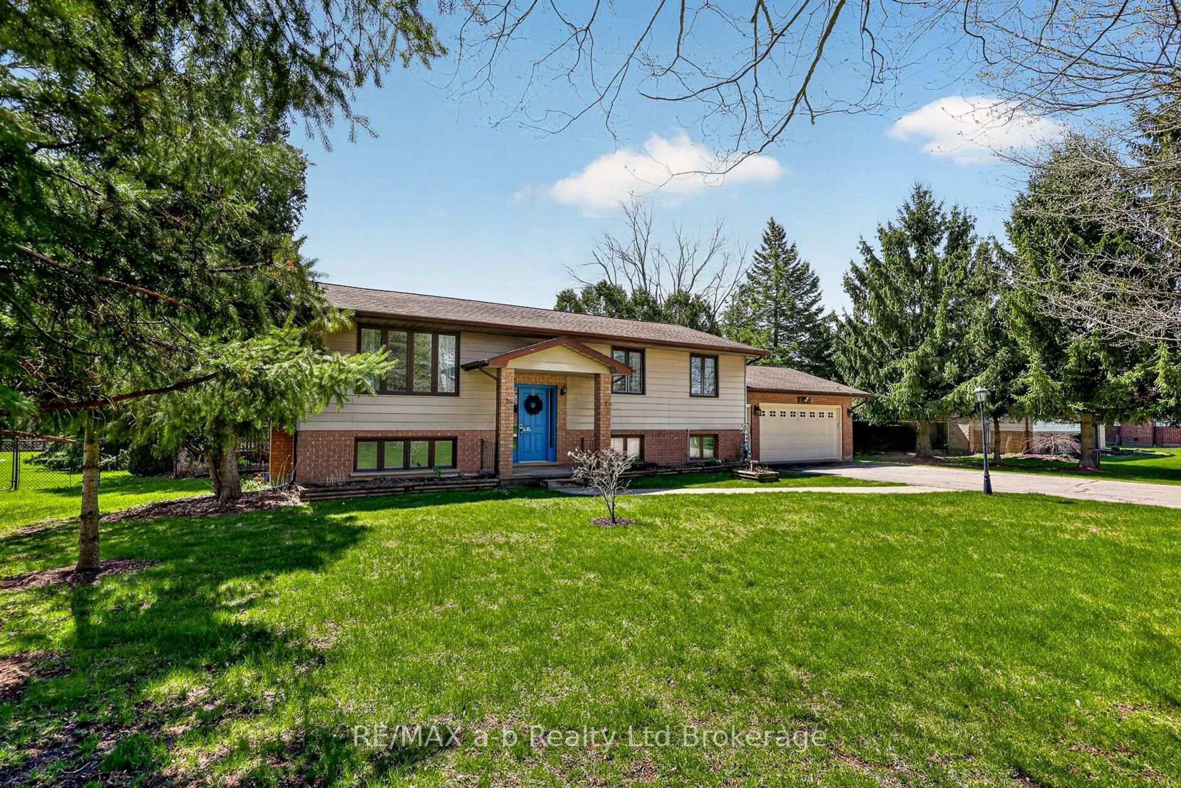 Home with brick exterior material, street for 2487 Mossley Dr, Thames Centre Ontario N0L 1V0